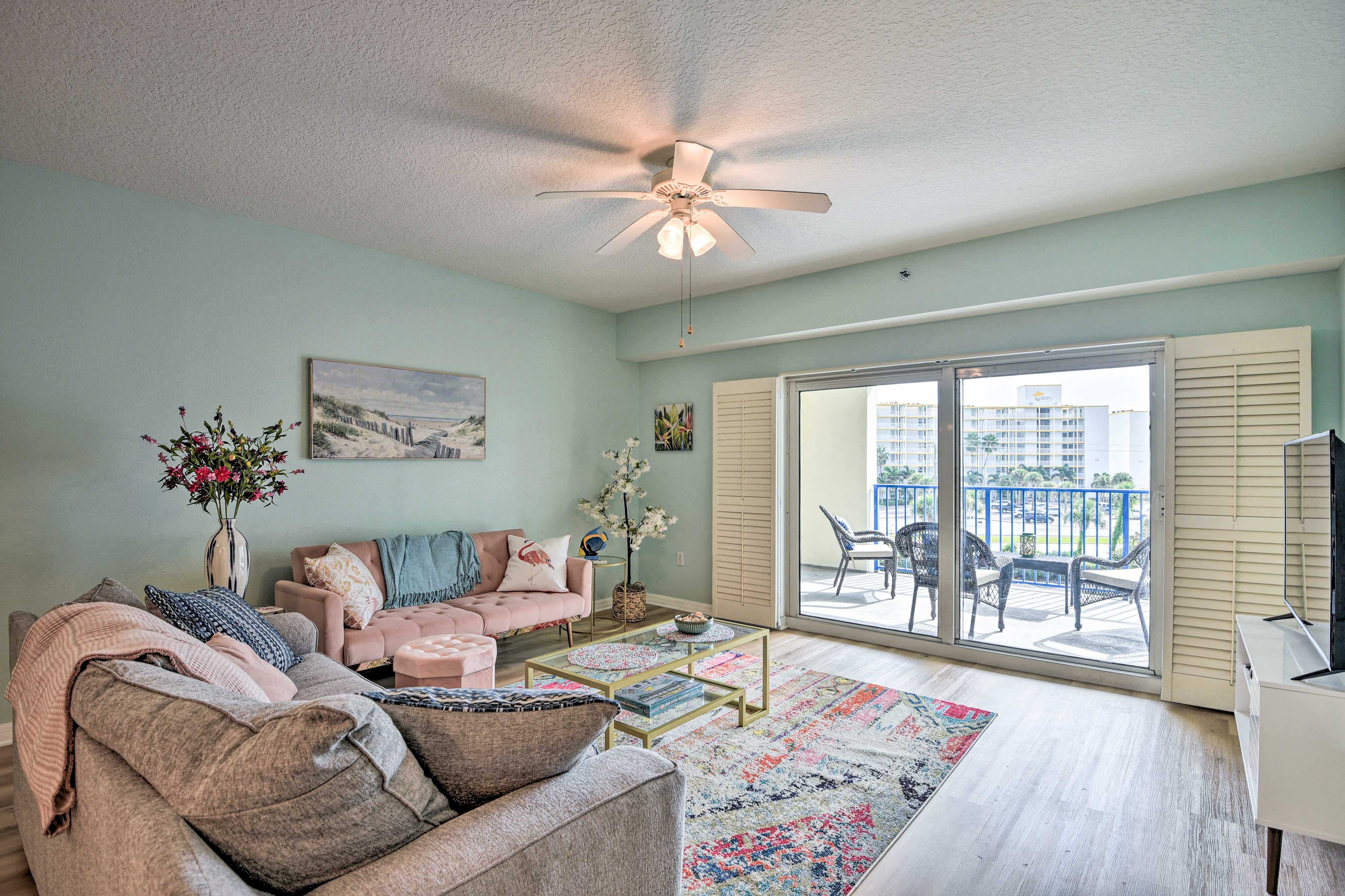 Living Room | Balcony Access | Single-Story Unit | 4th-Floor Condo