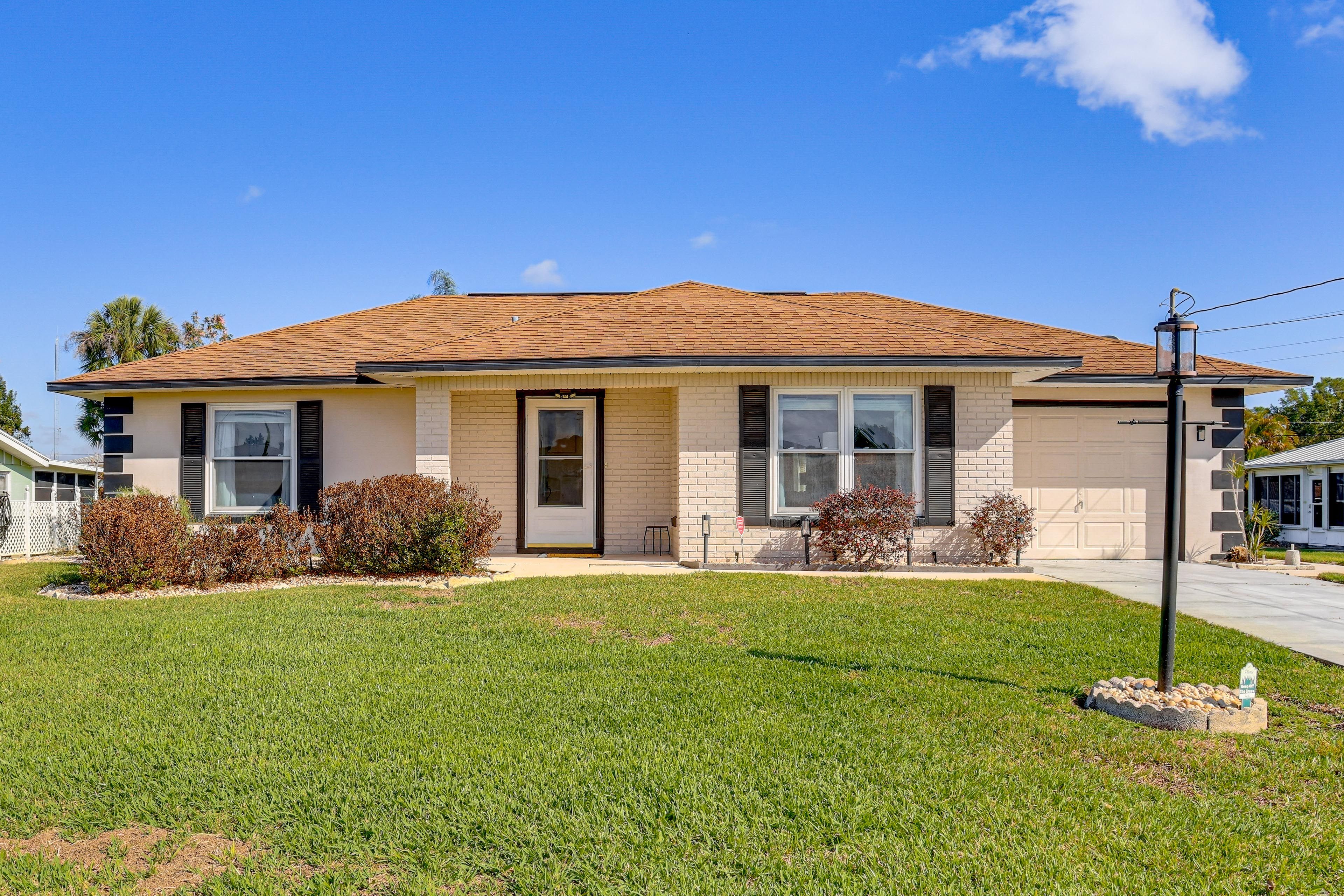 House Exterior | Driveway Parking (2 Vehicles) | Garage Parking (1 Vehicle)