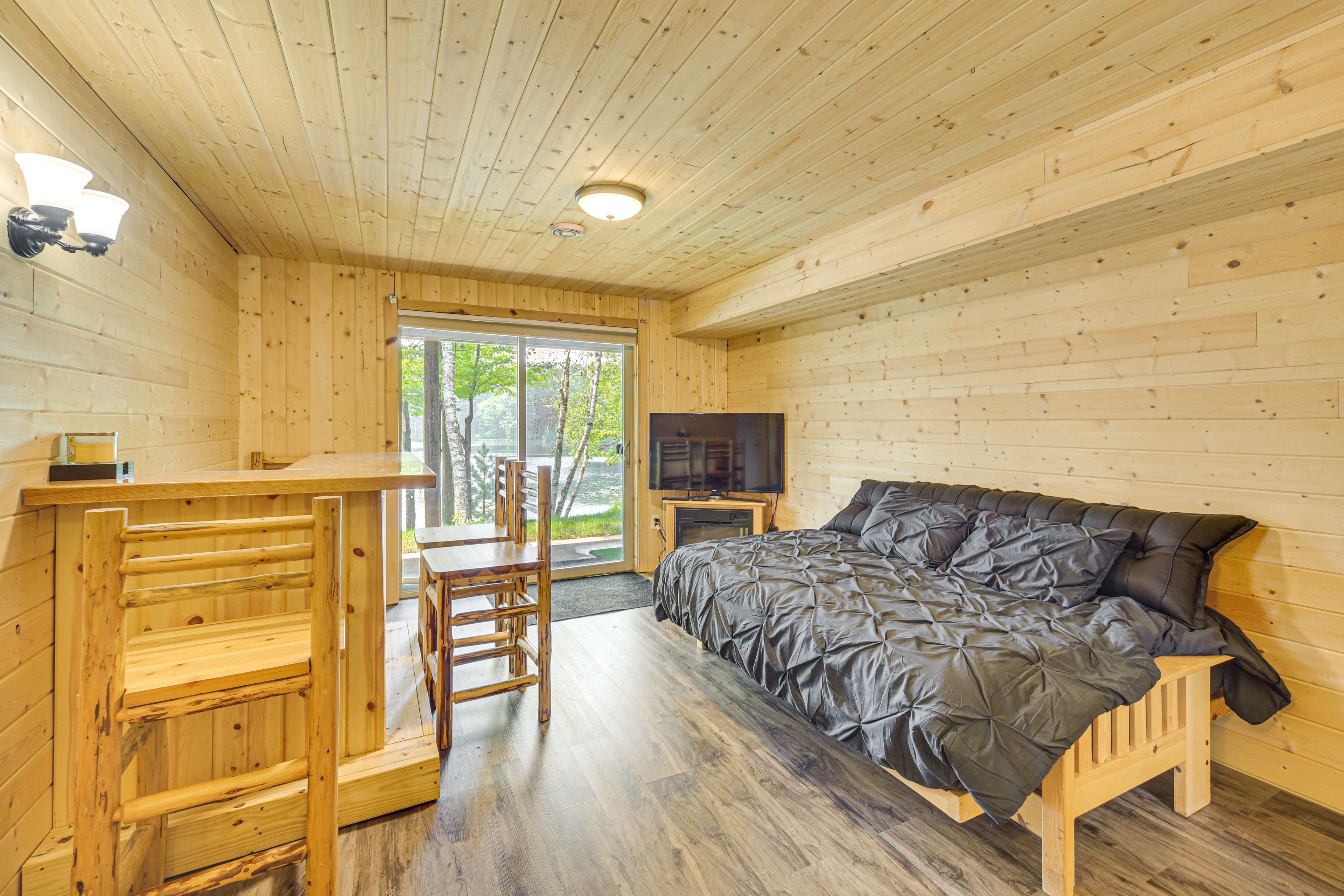 Basement Living Room | Electric Fireplace | Queen Futon