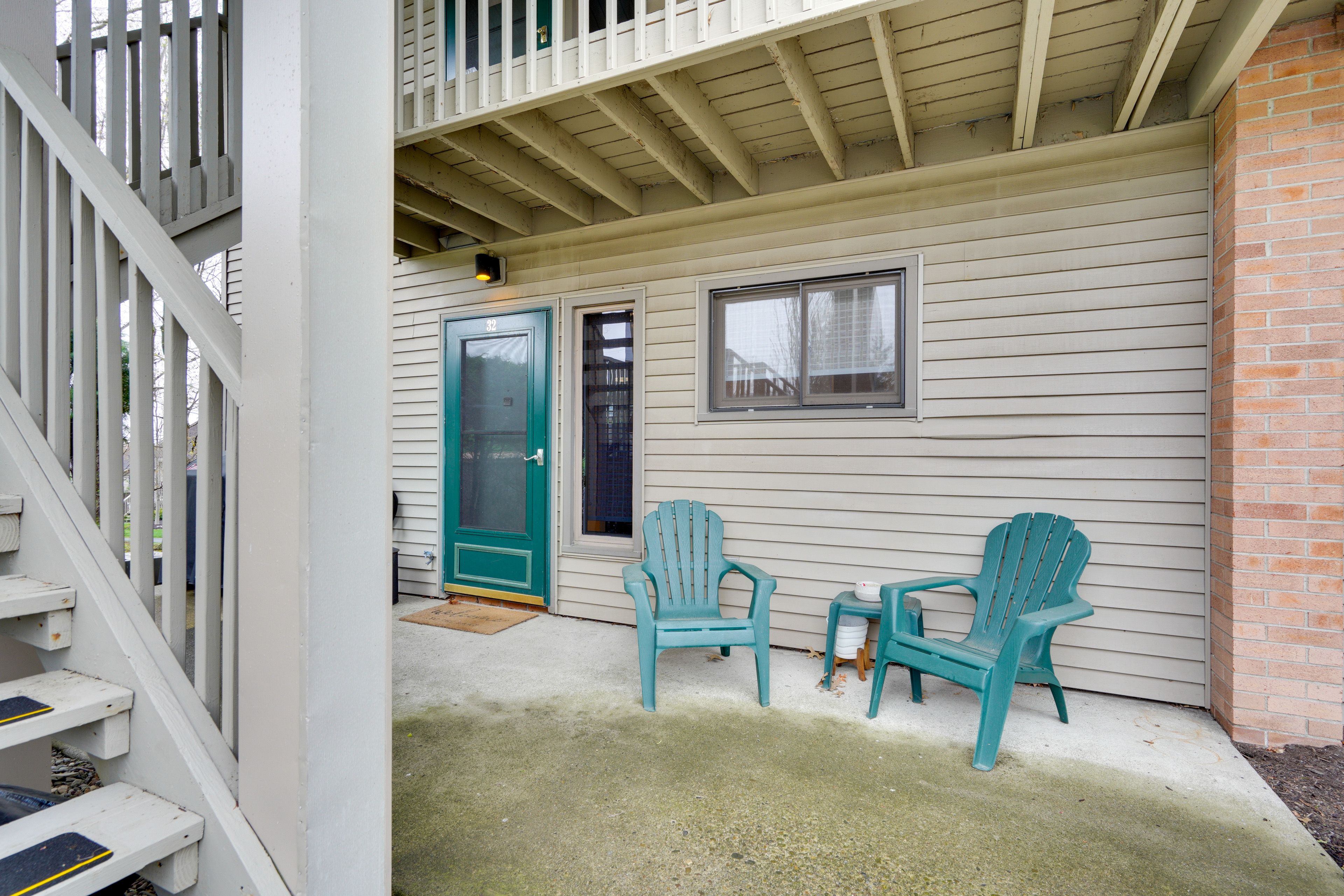 Covered Porch | Parking Available in Open Lot