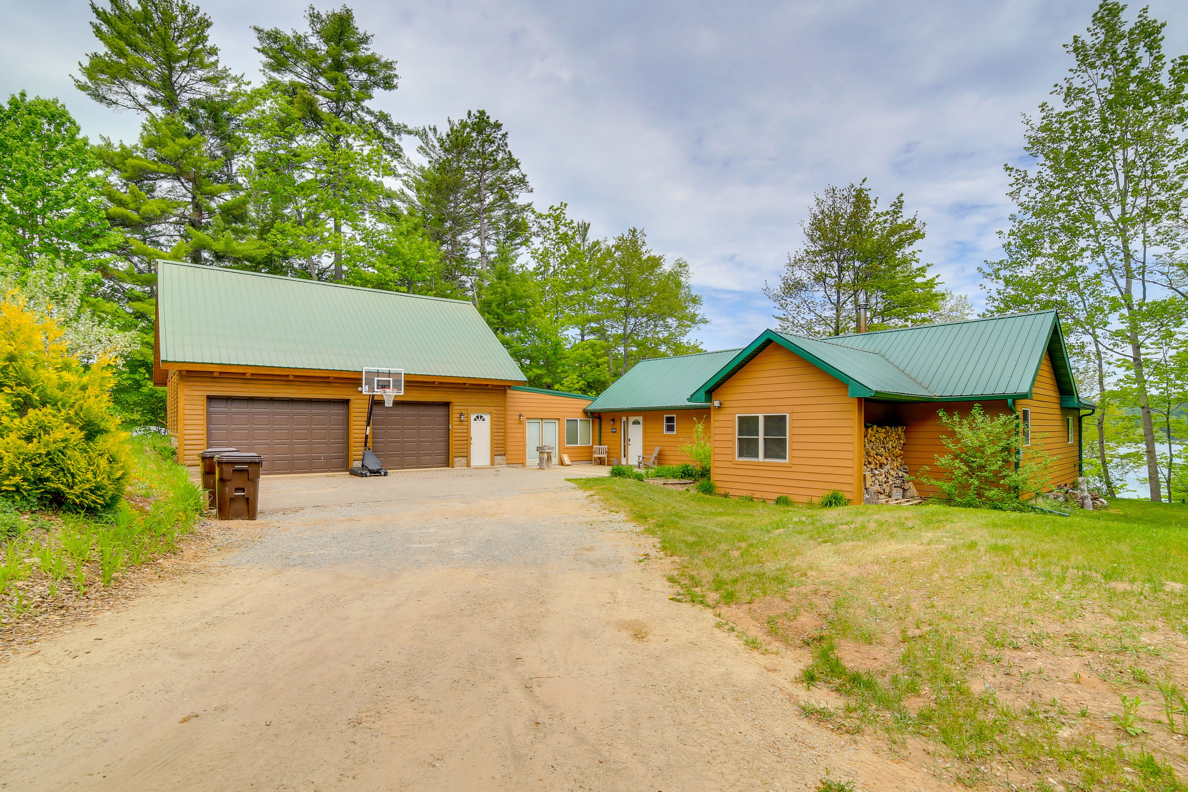 Cabin Exterior | 1-Story Home | Keyless Entry | On-Site Lake & Trail Access