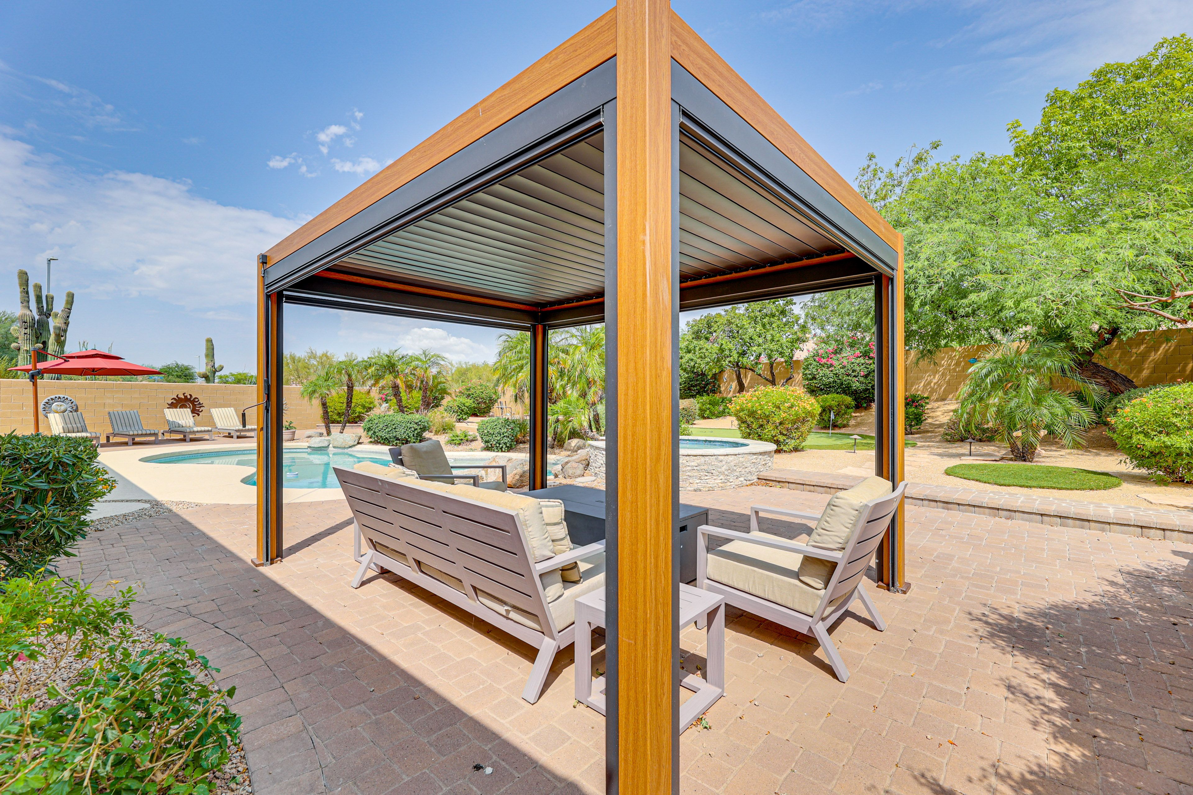 Private Backyard | Seating Area | Access to Pool/Spa