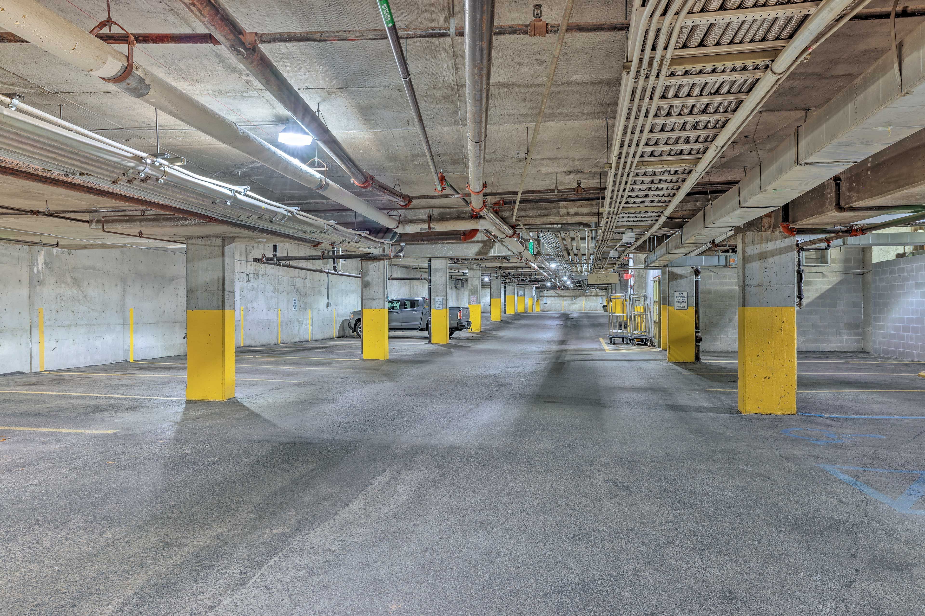 Parking | Garage - $20/Day (1 Vehicle) | Free Parking Lot Across Street