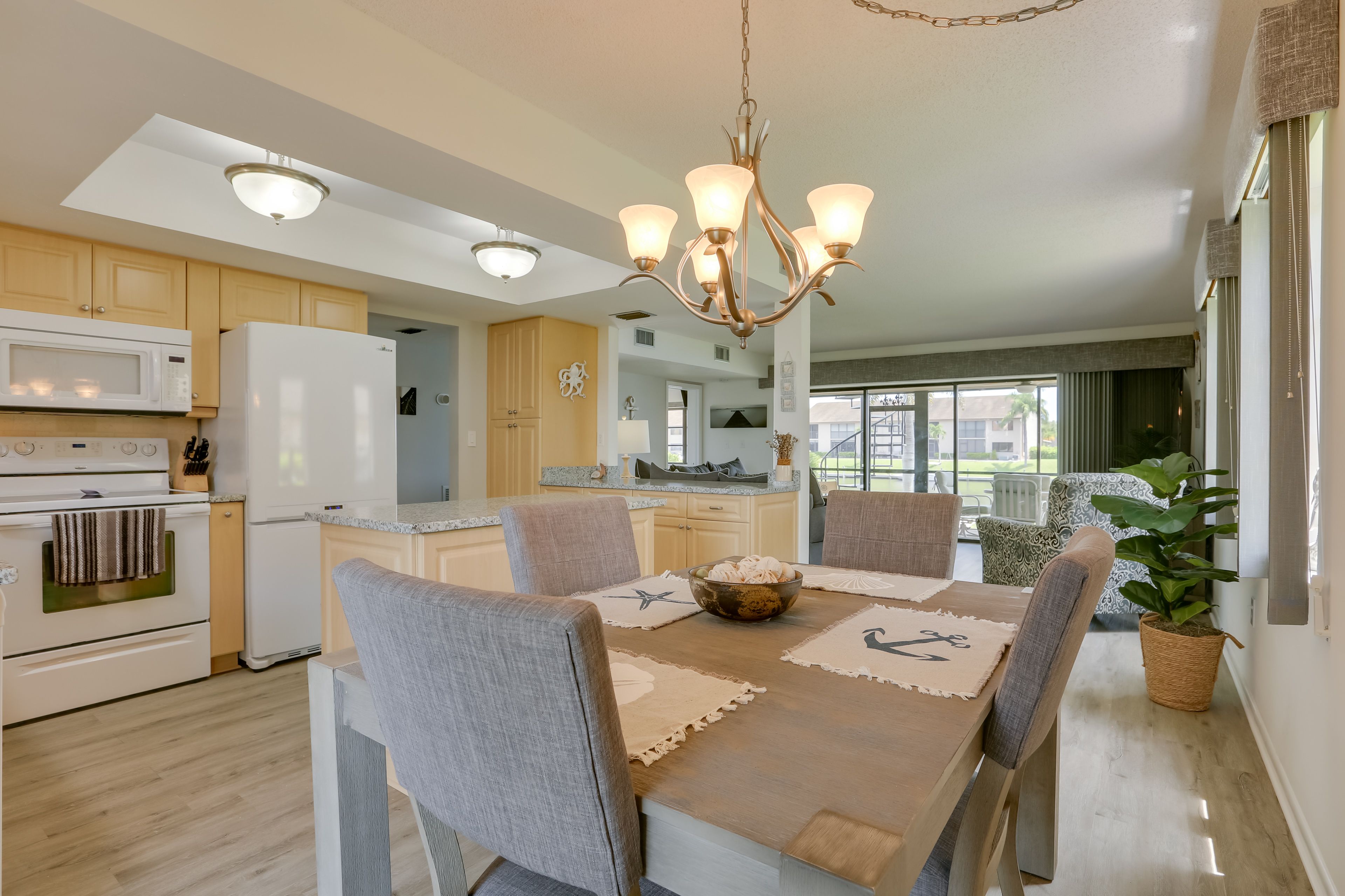 Dining Area | Dishware & Flatware | Patio Access | Central A/C