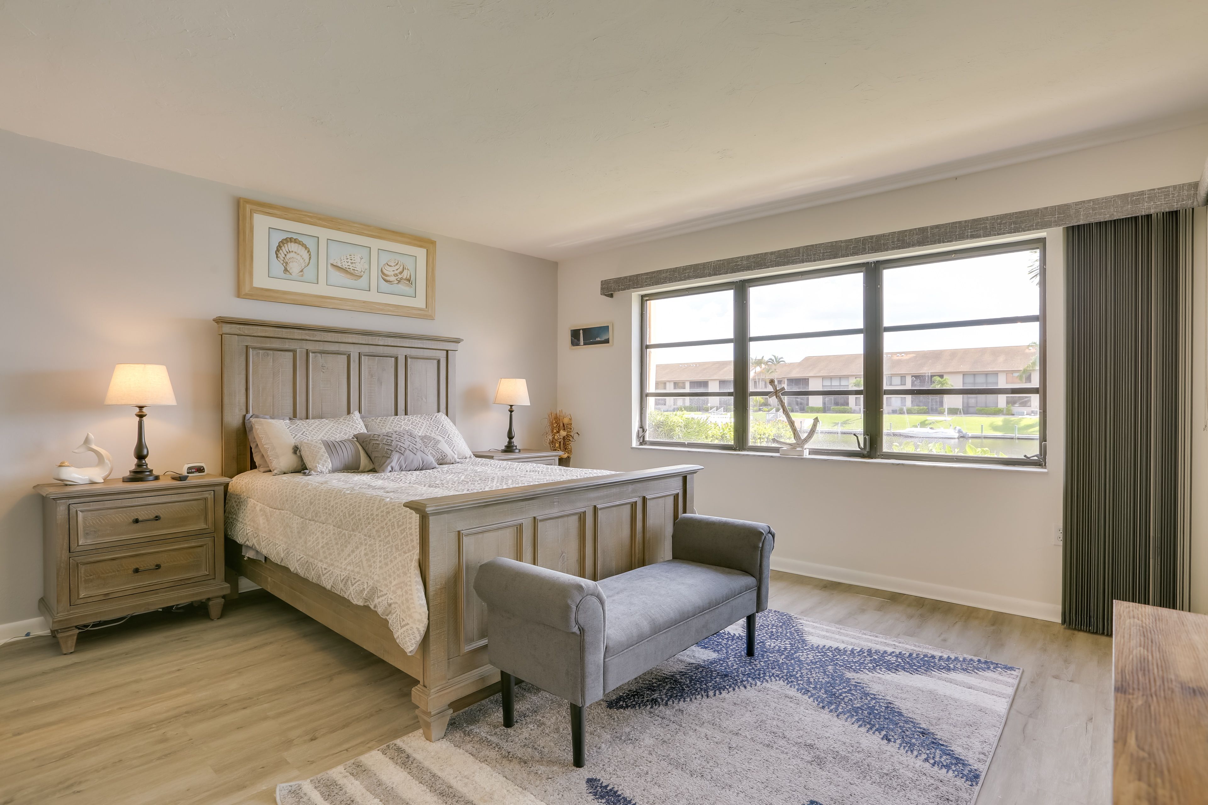 Bedroom 1 | Queen Bed | En-Suite Bathroom |  36” Smart TV | Lanai Access