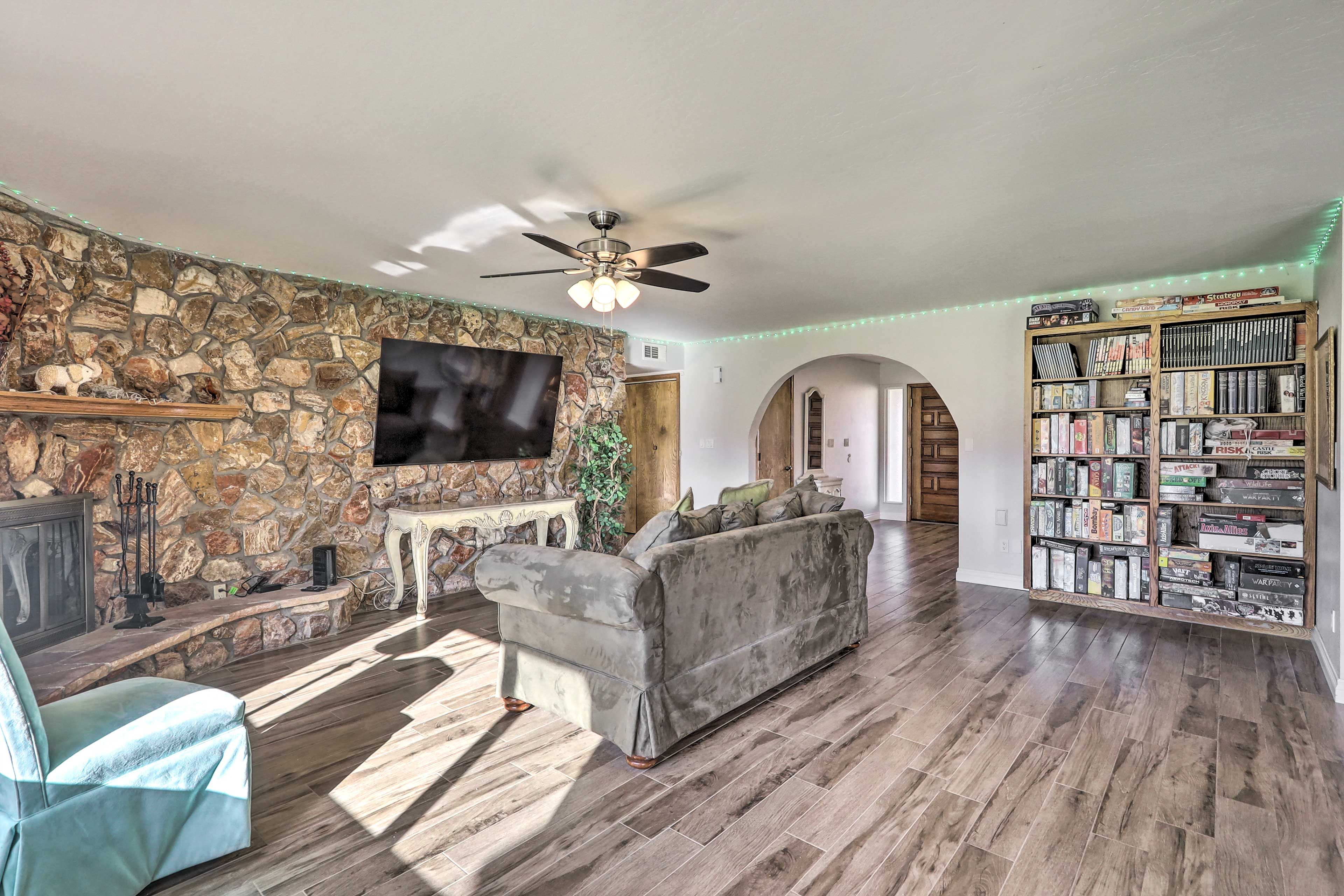 Living Room | Wood-Burning Fireplace | Video Game Console | Books & Board Games