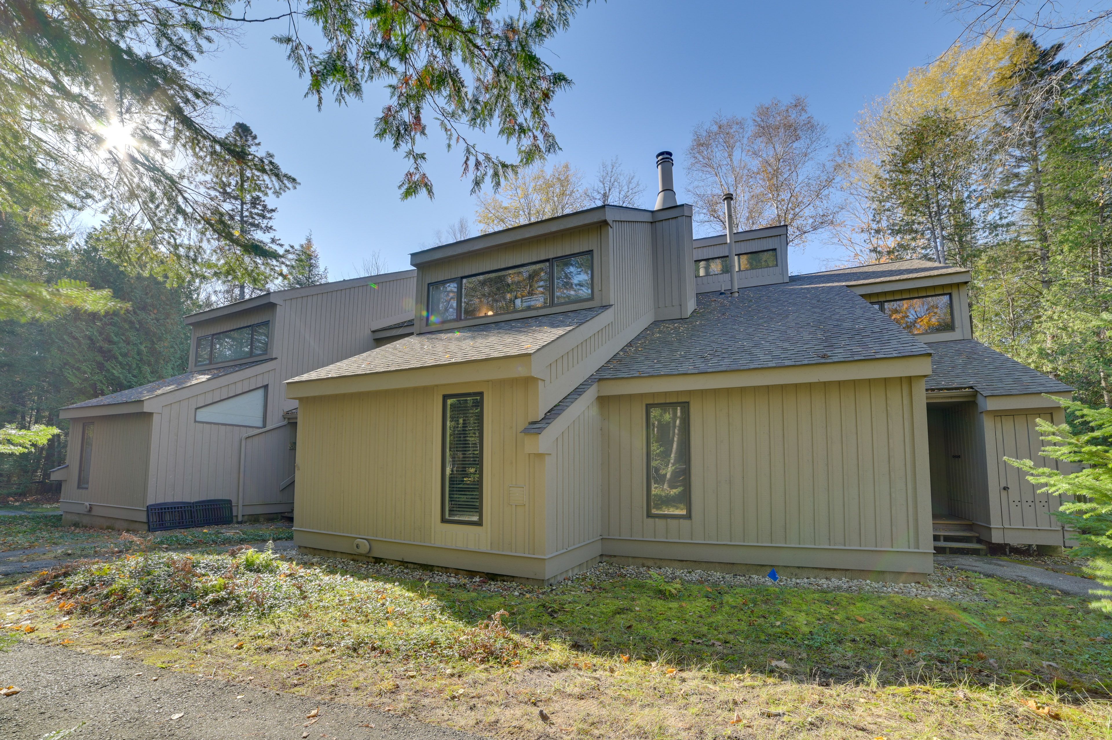 Condo Exterior | Parking | Community Lot (2 Vehicles) | Parking Passes Provided