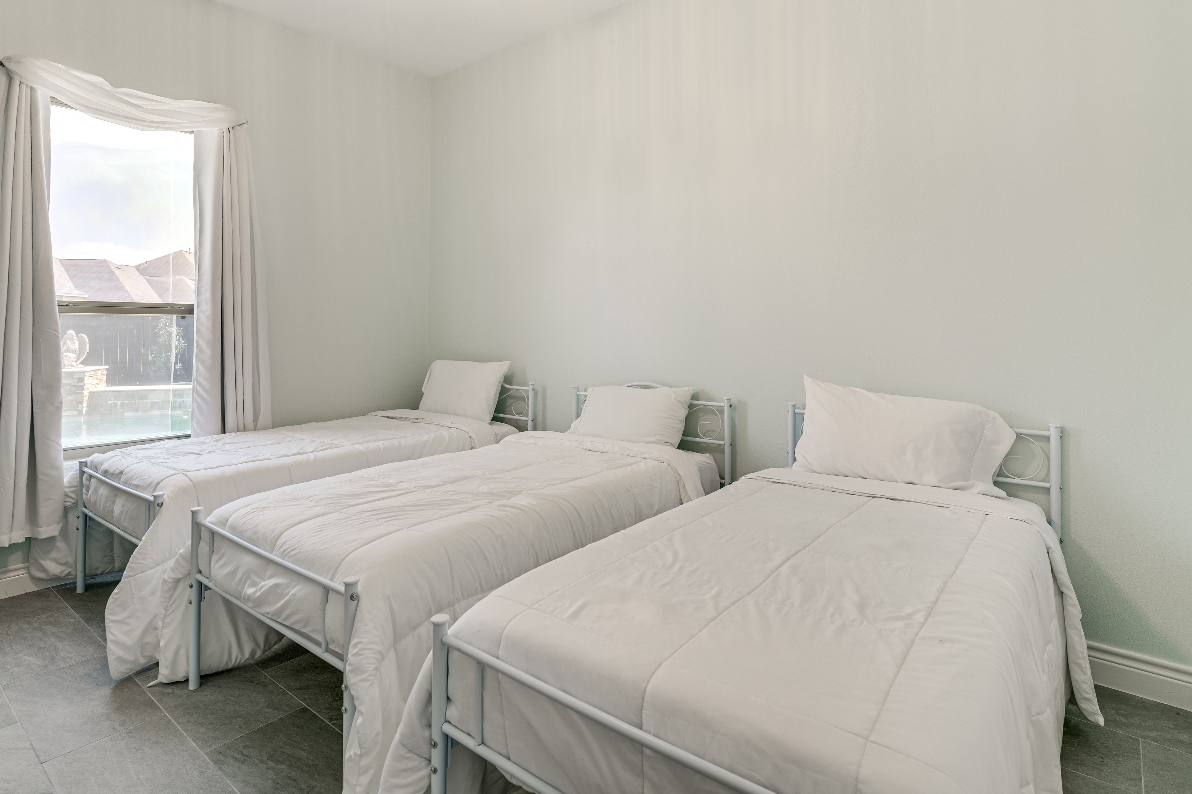 Bedroom 3 | 3 Twin Beds | Main Level
