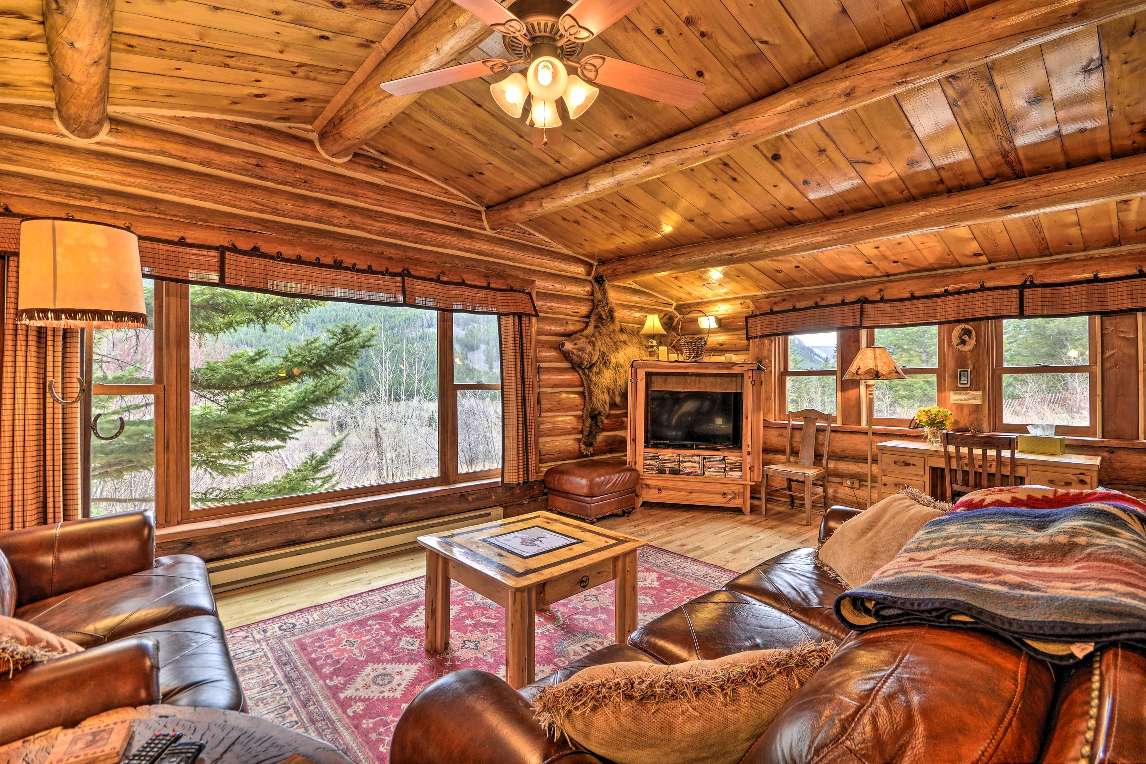 Living Room | Wood-Burning Stove | Antique Piano | 1st Floor