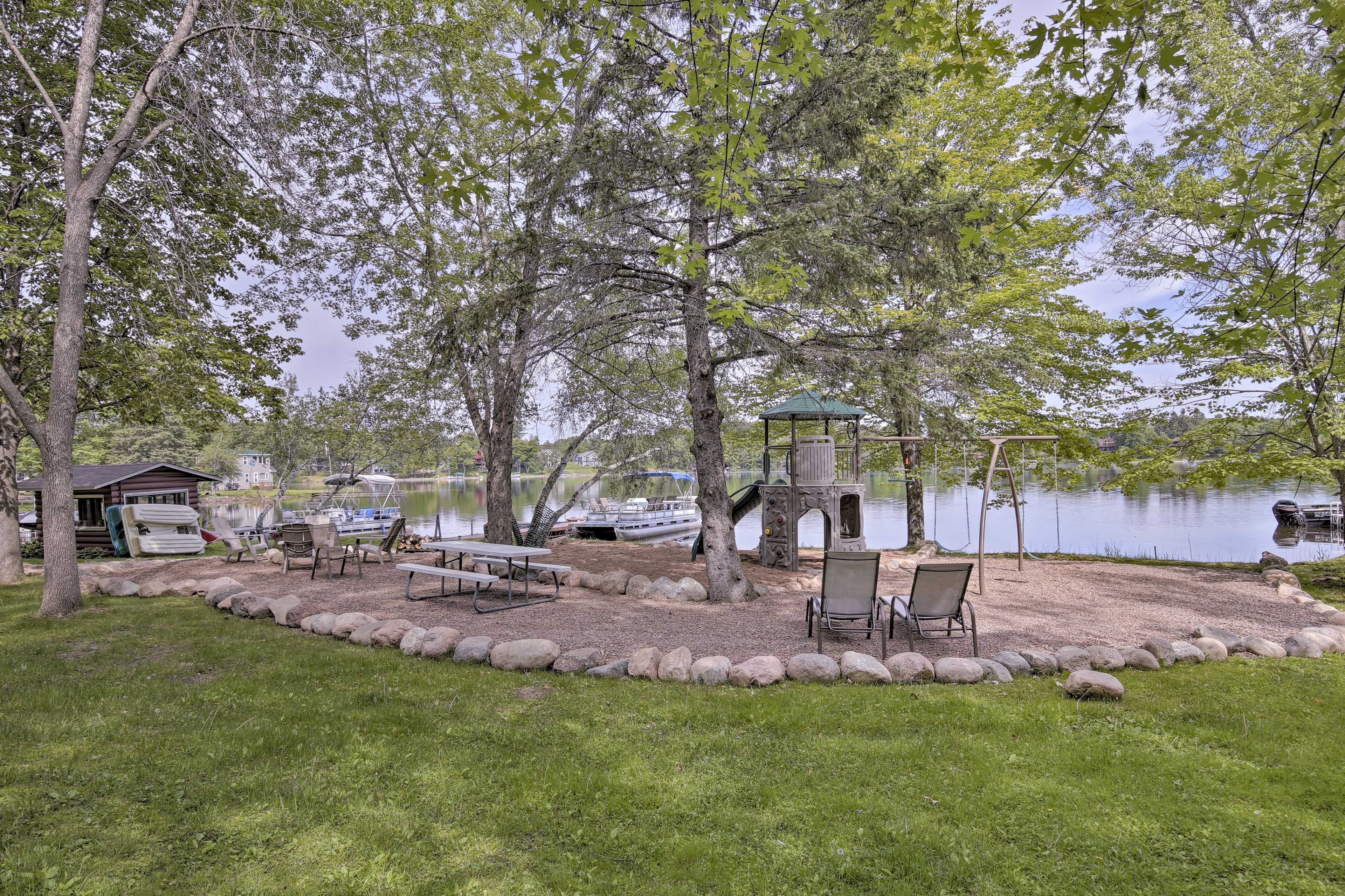 Shared Backyard | Boat Dock | Fire Pit | Canoes | Playground