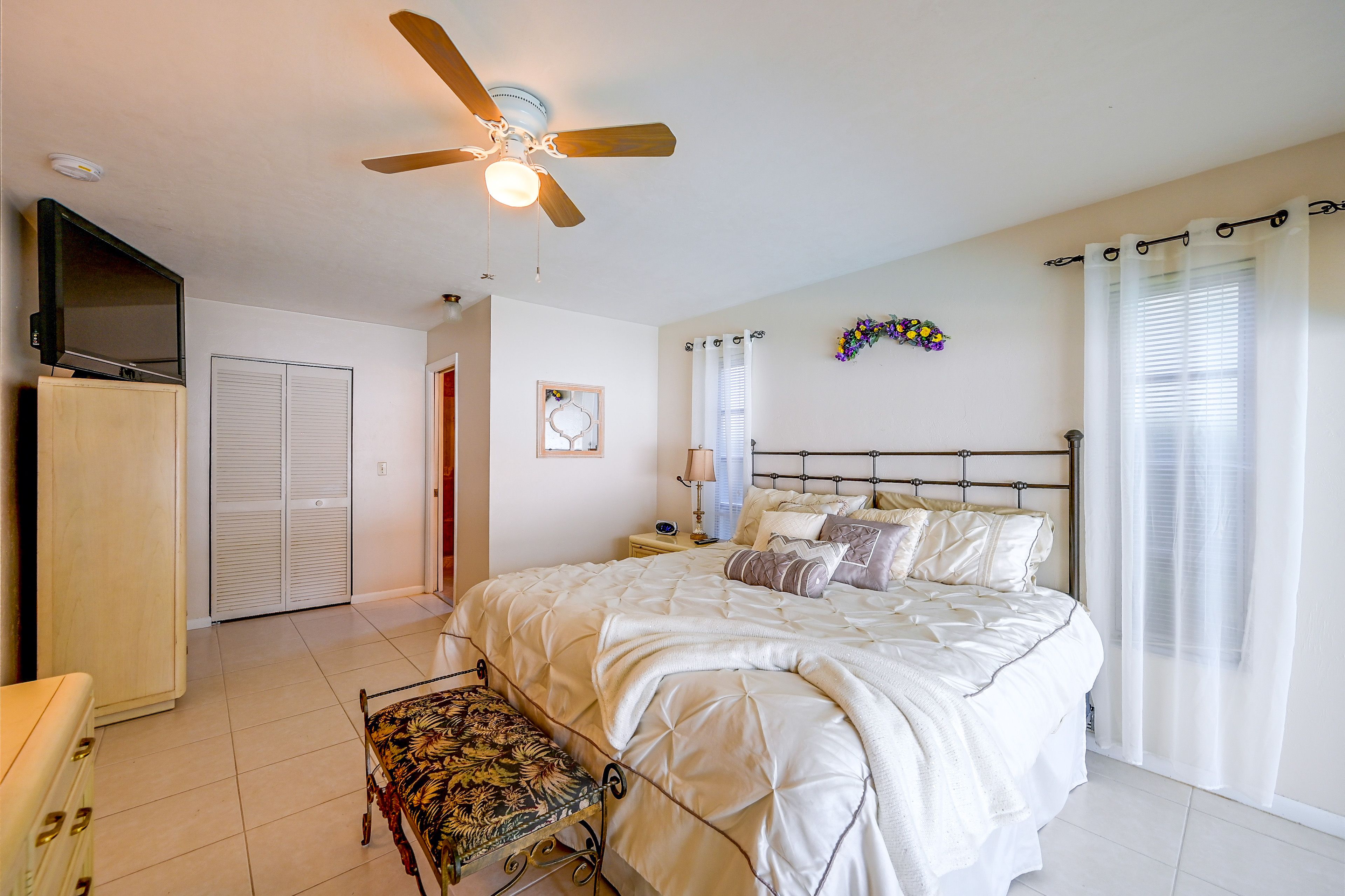 Bedroom 1 | King Bed | Access to Lanai | Linens/Towels Provided