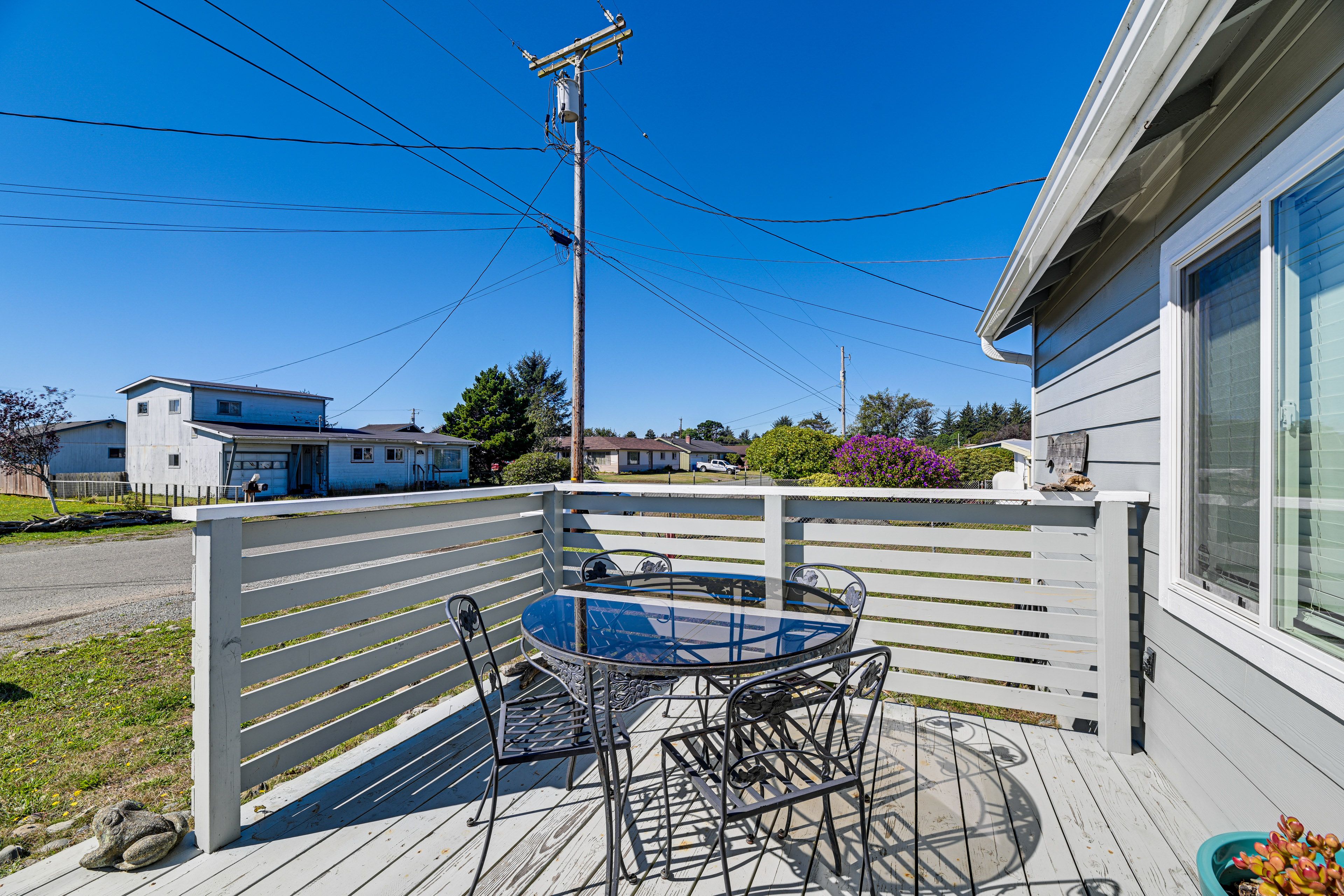 House Exterior | Furnished Porch | Dining Area