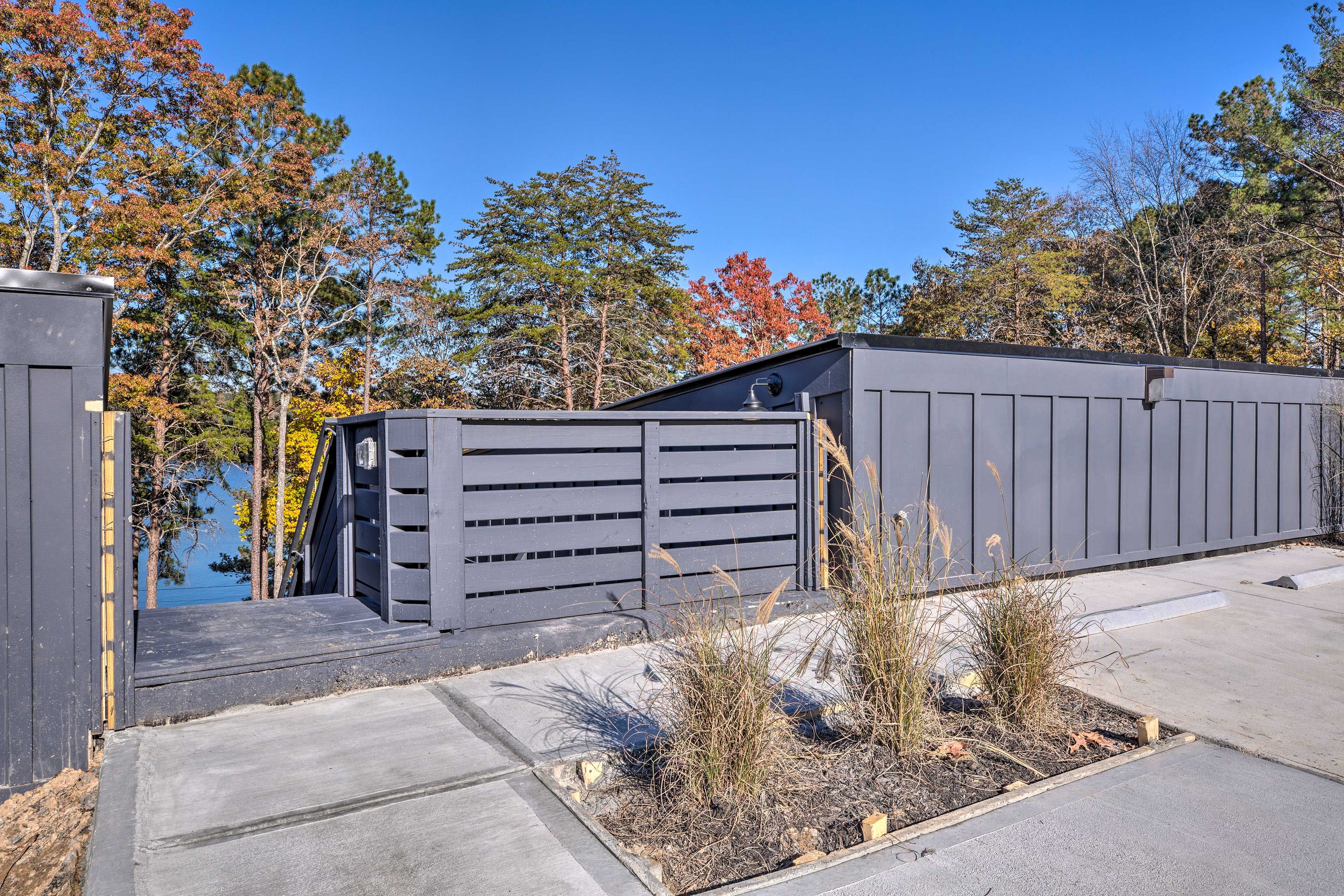 Unit Exterior | Stairs to Access Unit Entrance | Driveway Parking (2 Vehicles)