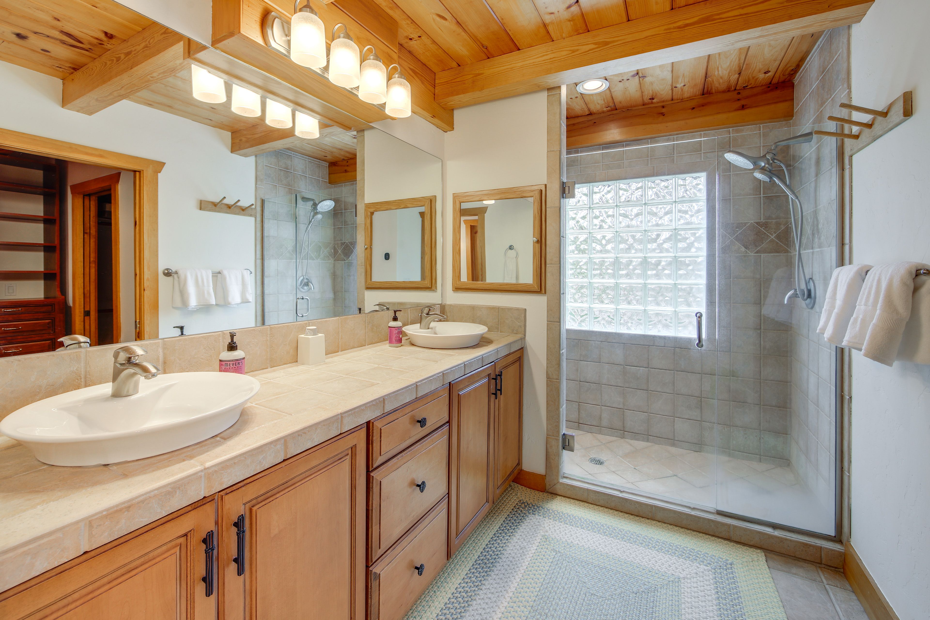 En-Suite Bathroom | Main Level | Walk-In Closet | Towels Provided
