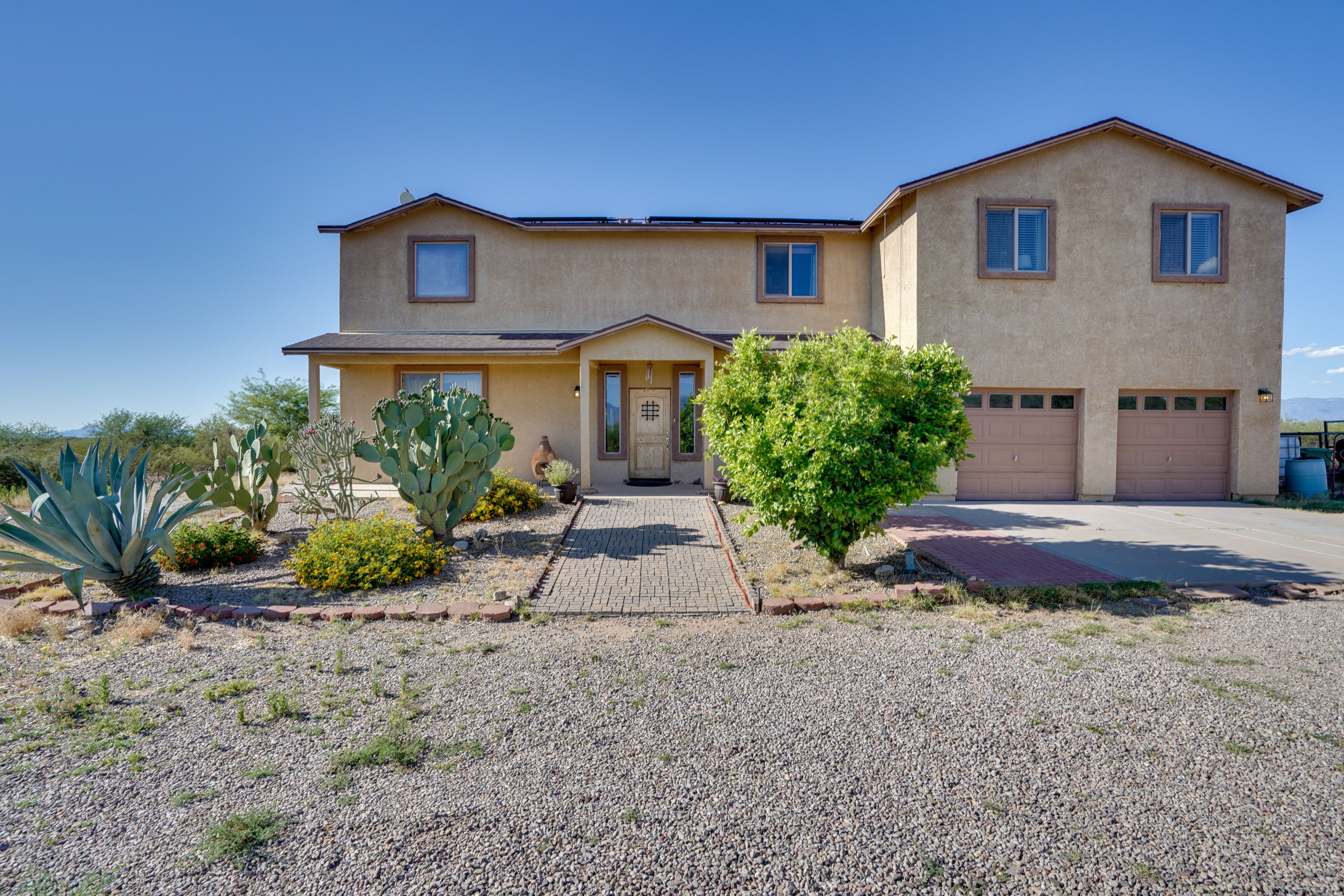 Property Exterior | Garage (2 Vehicles) | Driveway (8 Vehicles)