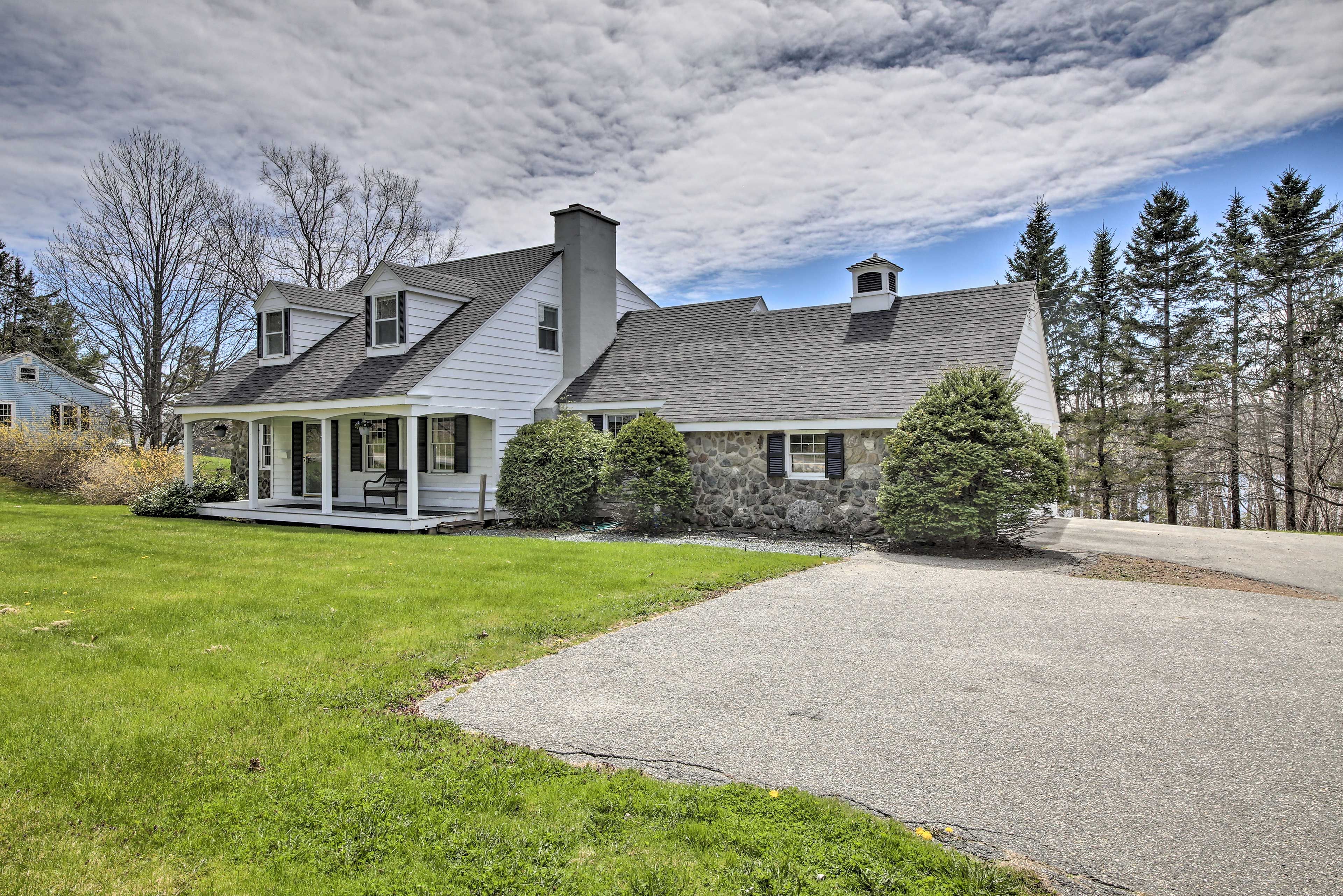 Home Exterior | Garage Parking (2 Vehicles) | Driveway Parking (5 Vehicles)