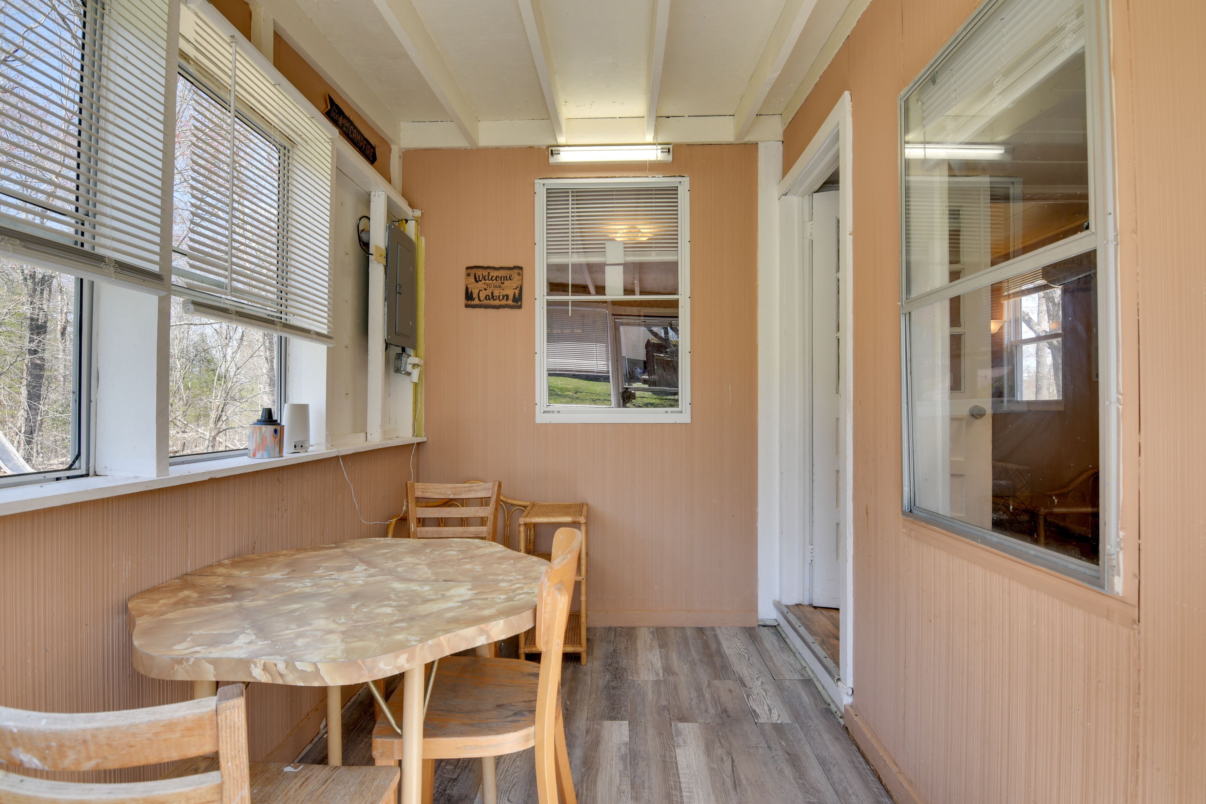 Sunroom | Dining Area | Dishware/Flatware | Trash Bags/Paper Towels