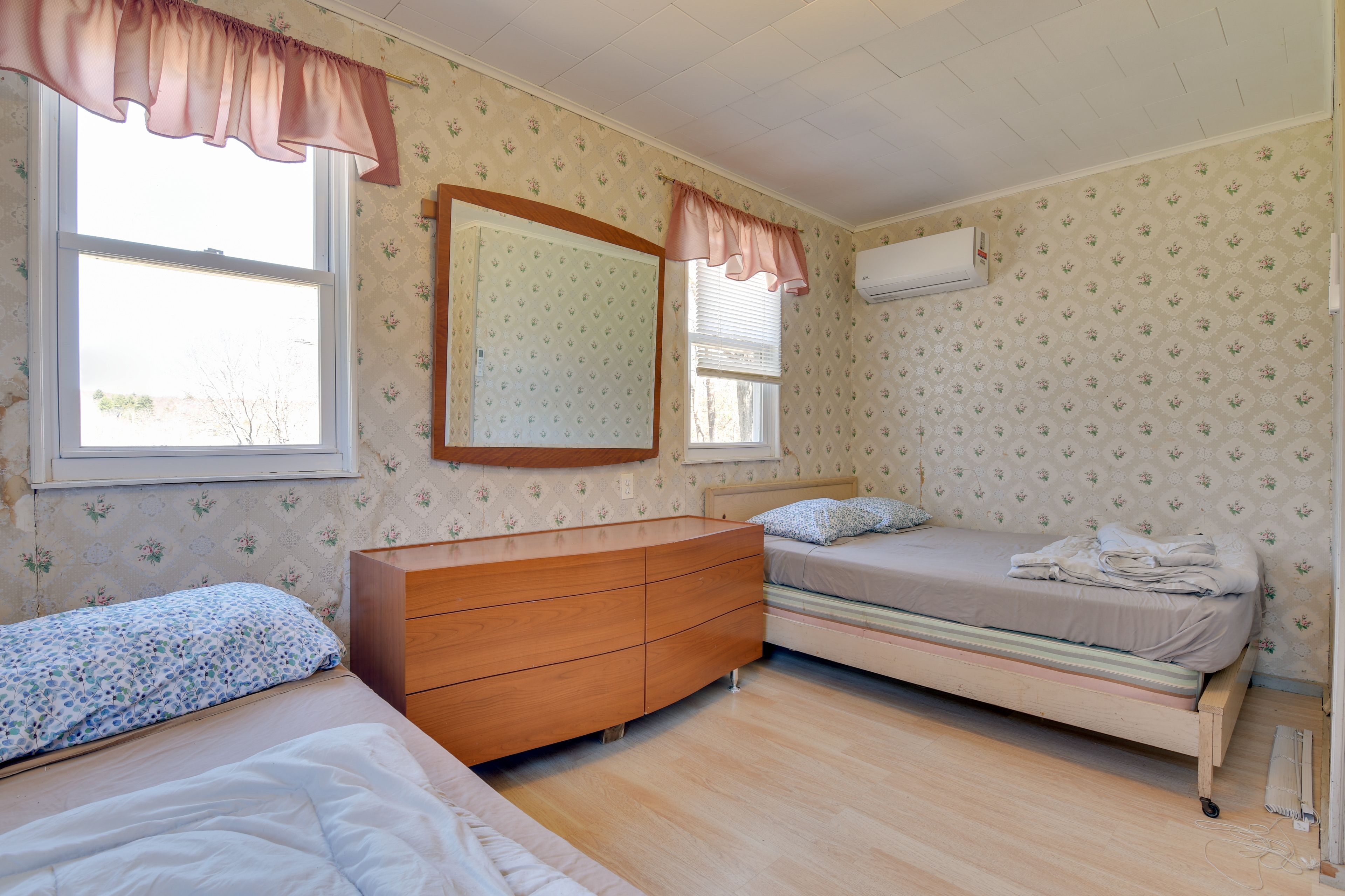Bedroom 1 | 2 Full Beds | Linens Provided