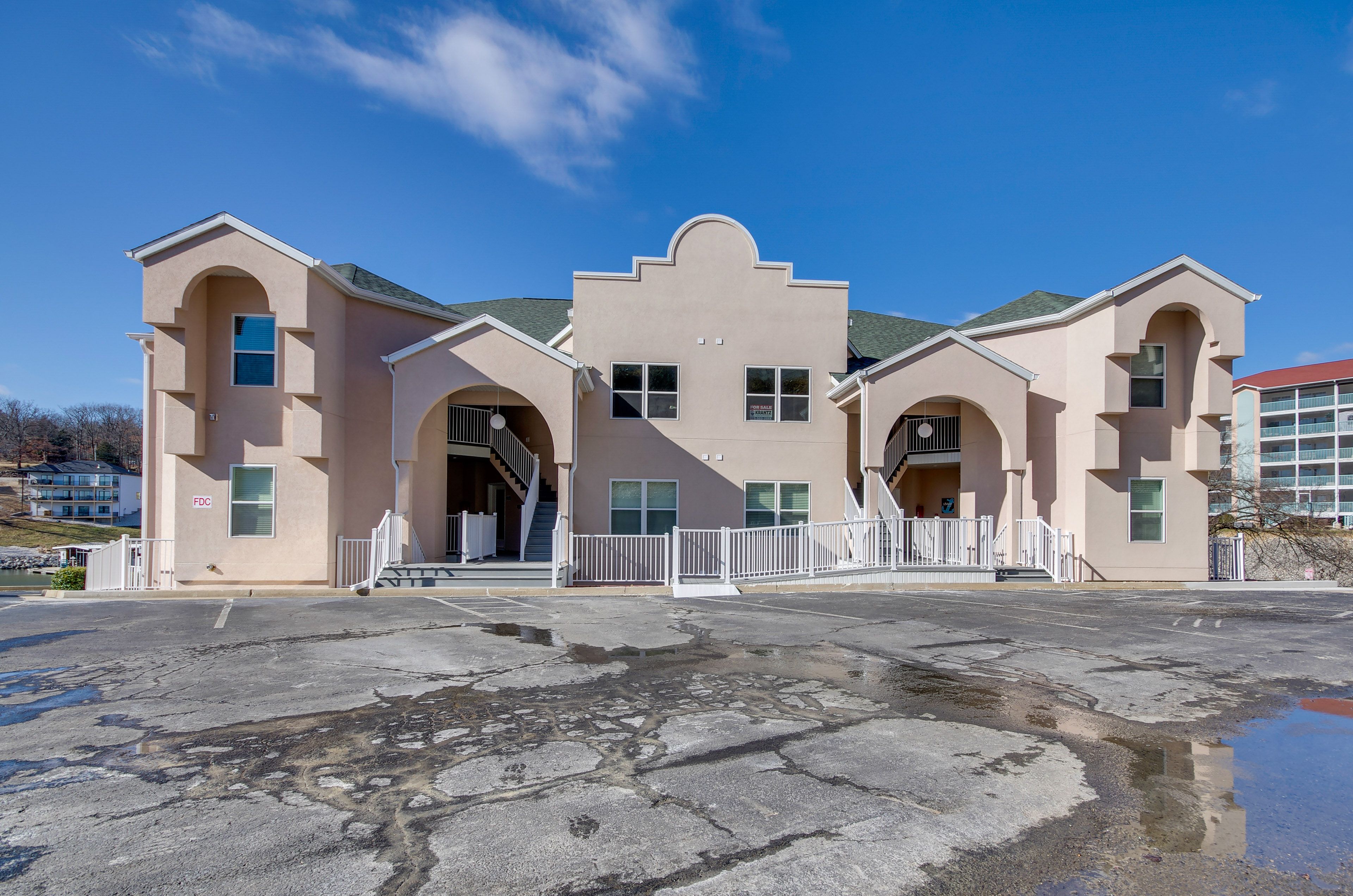 Condo Exterior | Parking | Community Lot (2 Vehicles)