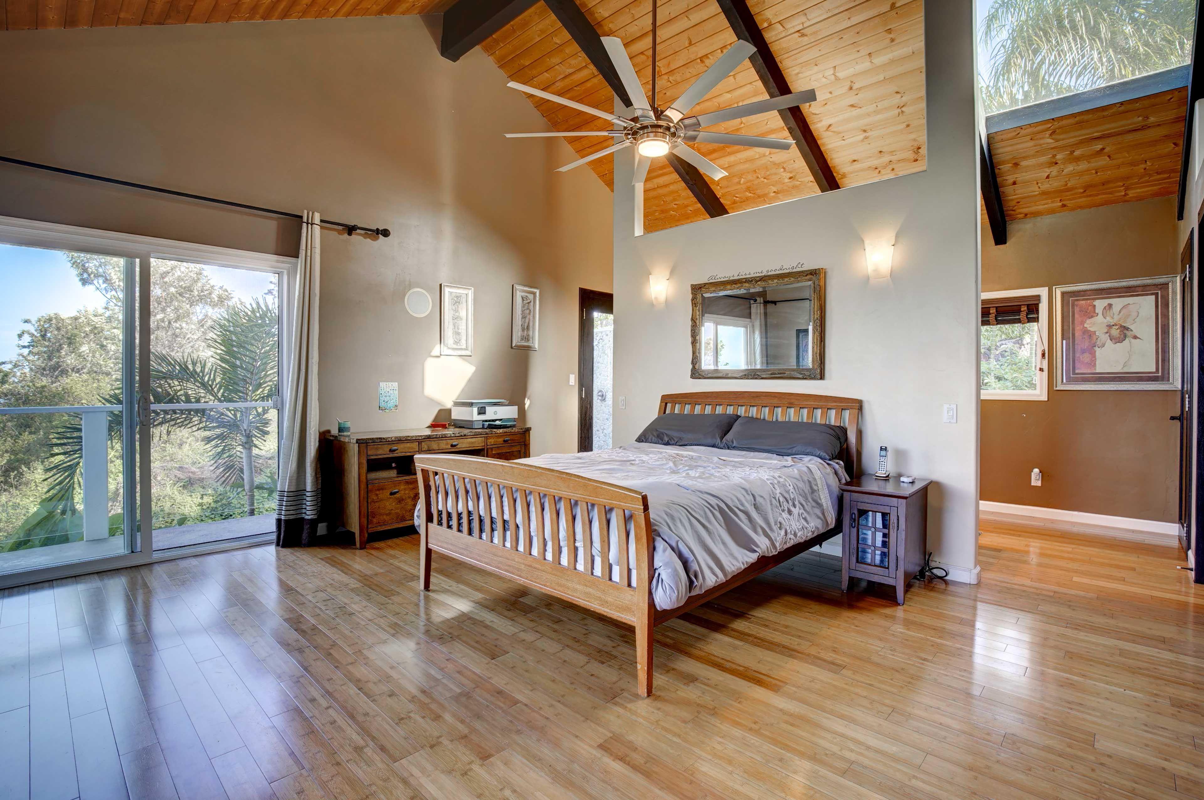 Bedroom 1 | Queen Bed | Balcony Access | En-Suite Bathroom