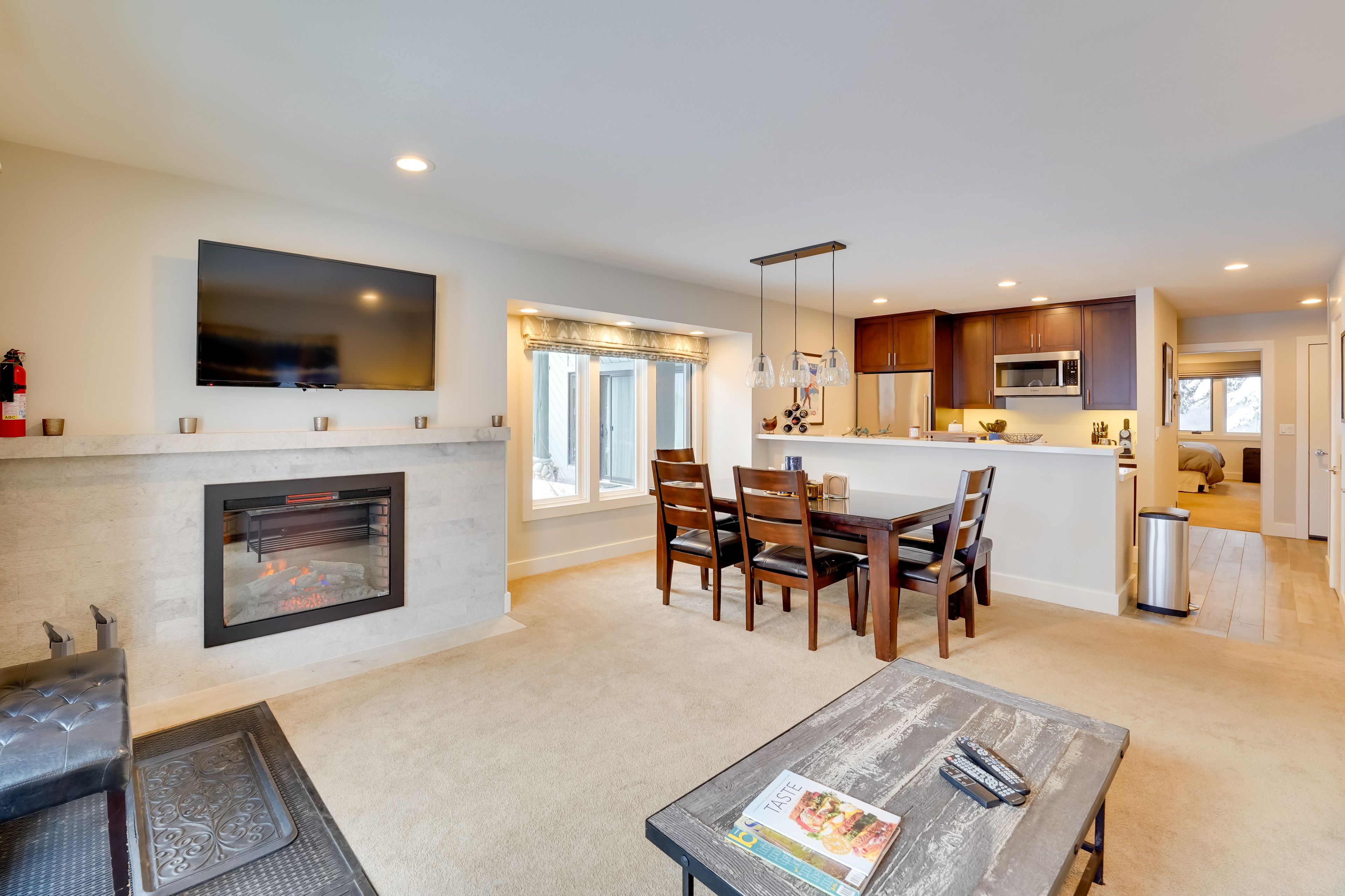 Living Room | Smart TV | Electric Fireplace | Queen Sleeper Sofa | Free WiFi