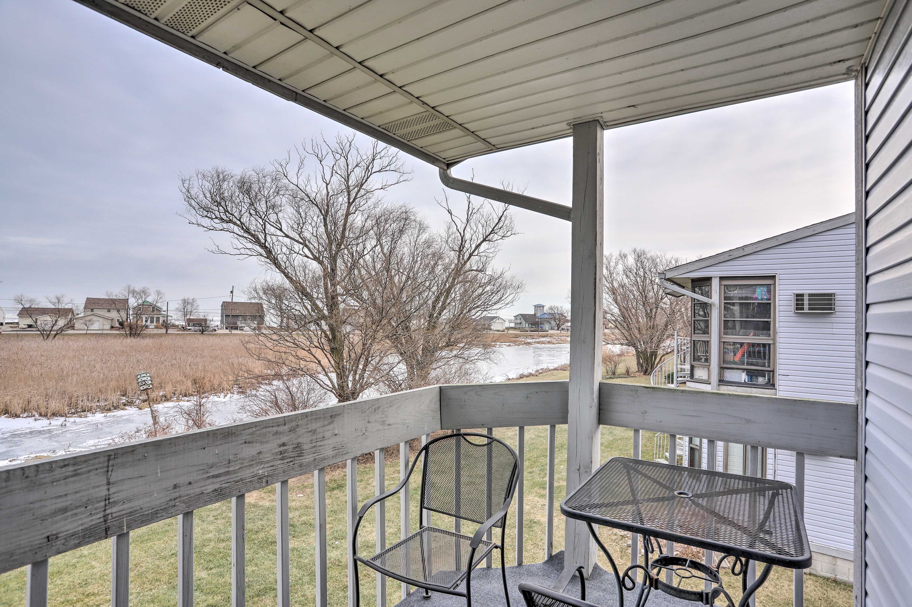 Covered Balcony | Outdoor Dining Table | Lake & Wetland Views
