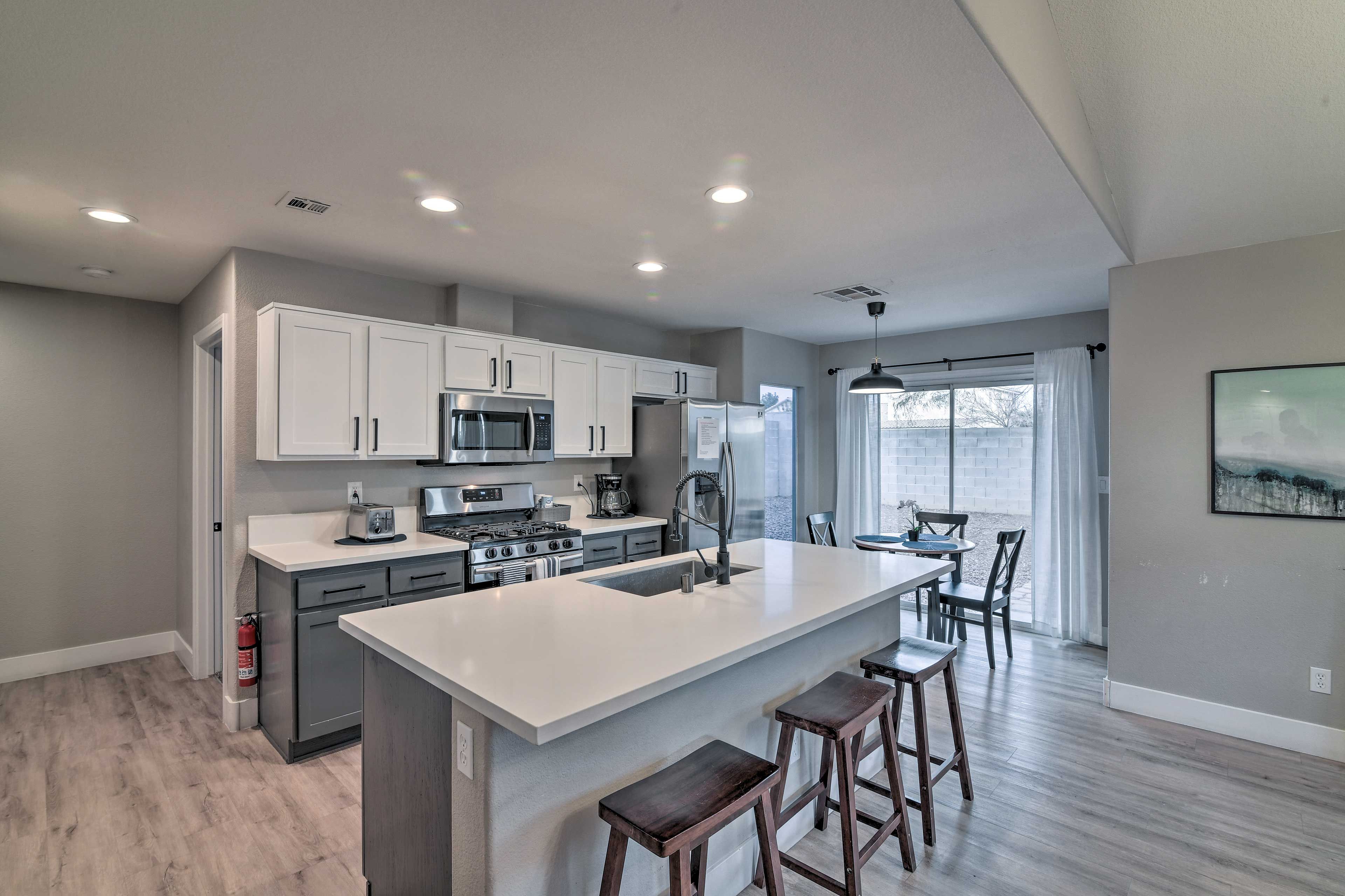 Kitchen | Fully Equipped w/ Stainless Steel Appliances | 3-Person Breakfast Bar