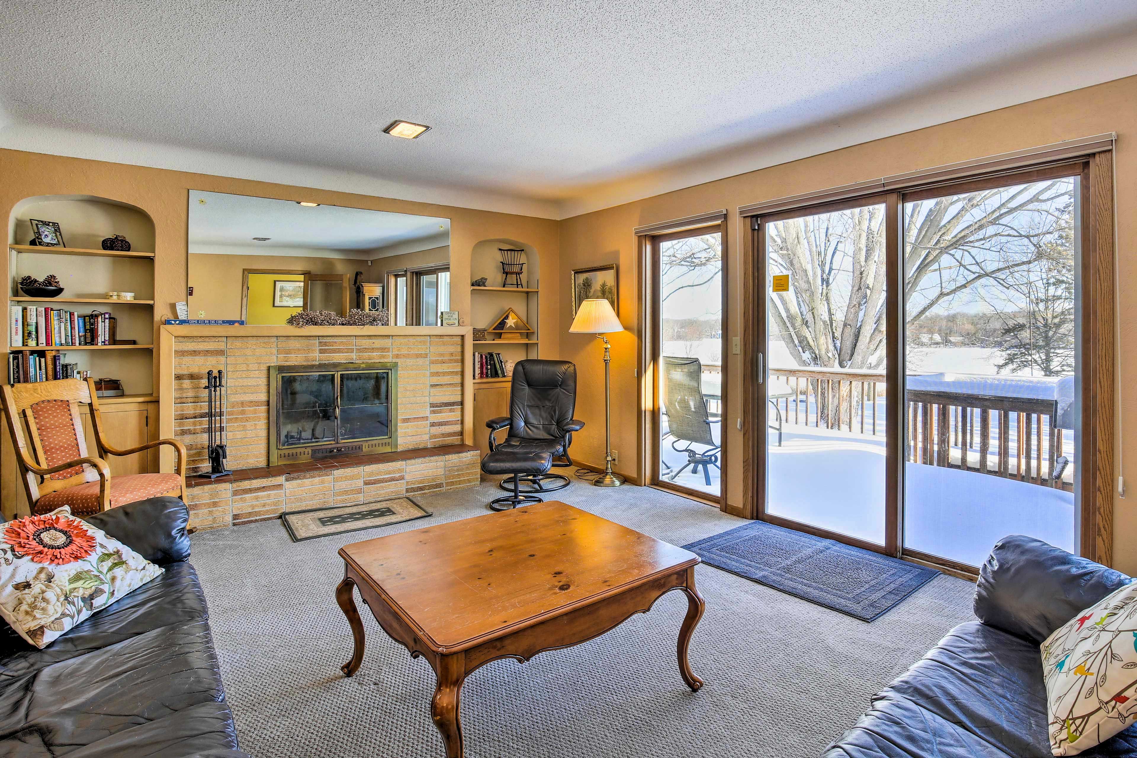 Living Room | Wood-Burning Fireplace (Decorative Only) | Books & Board Games