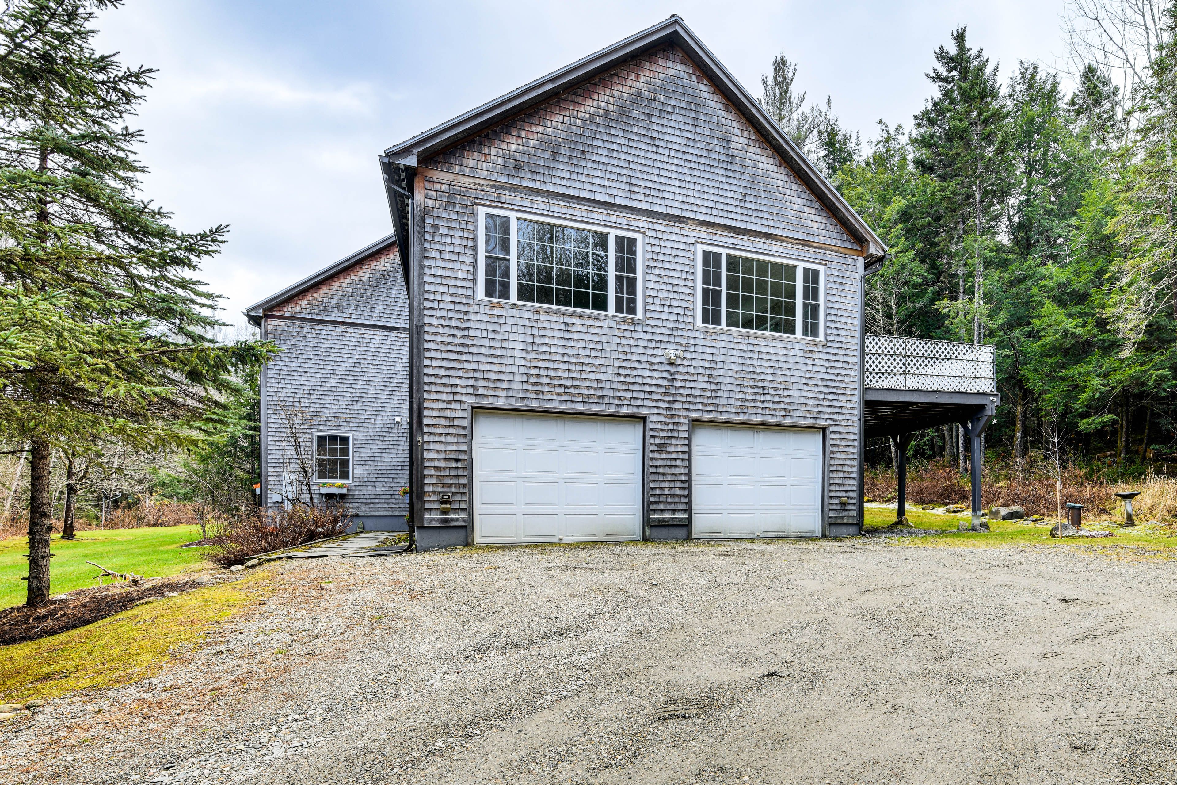 Property Exterior | Garage & Driveway Parking (5 Total Vehicles)