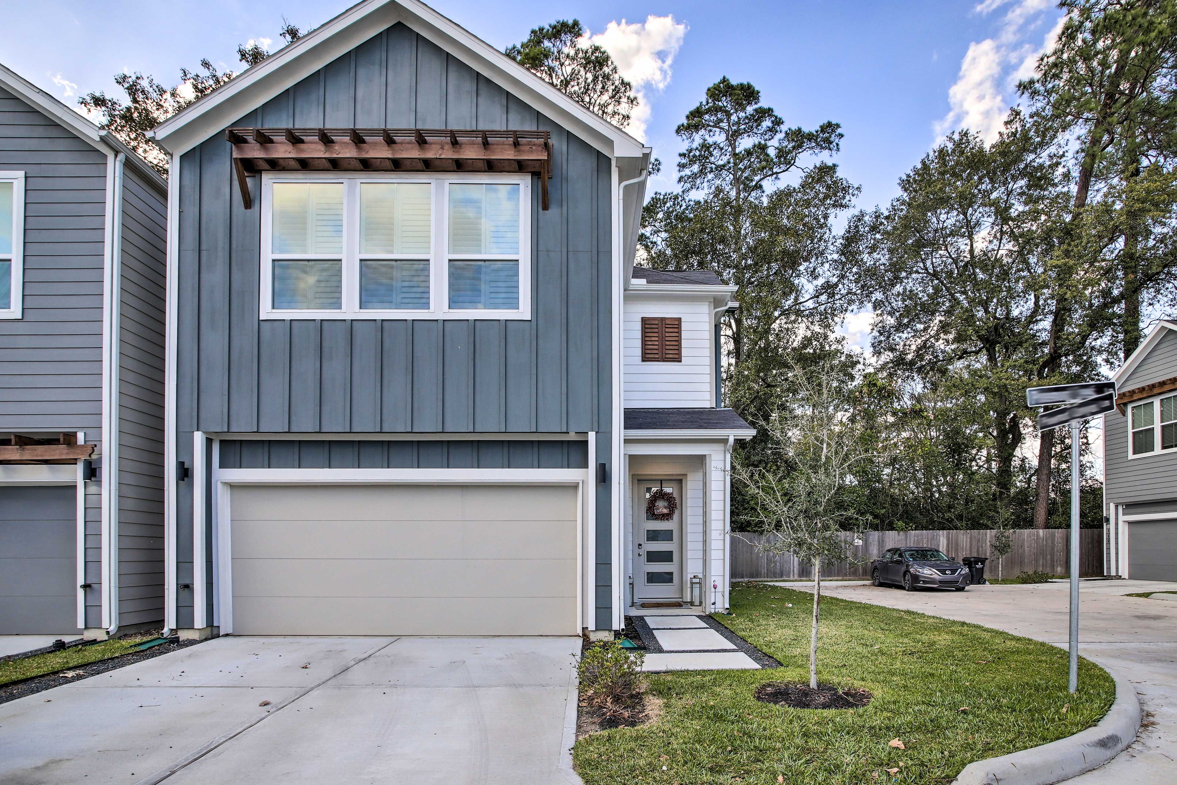Townhome Exterior | Driveway Parking (2 Vehicles) | Garage Off-Limits
