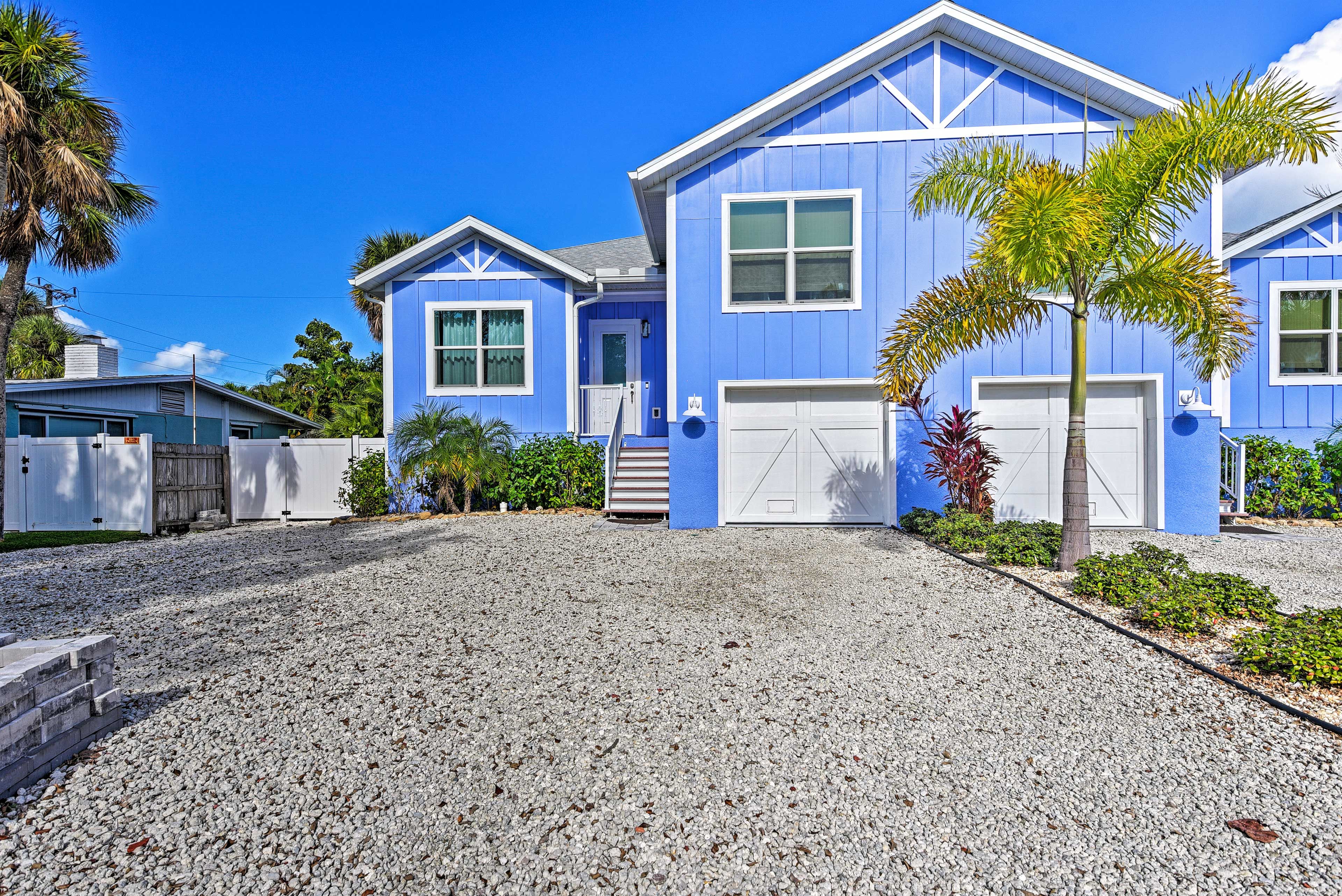 Townhome Exterior | Driveway Parking (4 Vehicles)