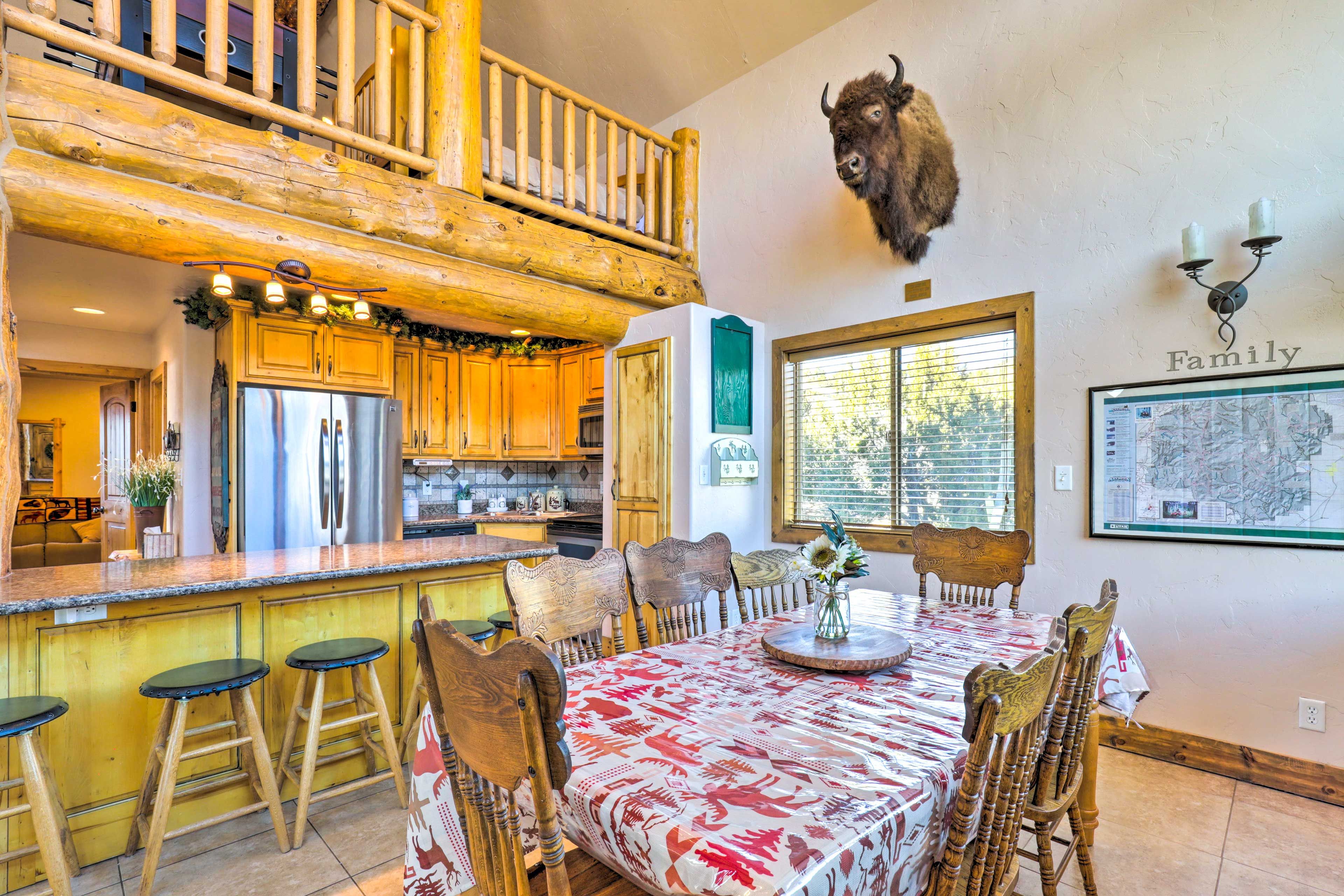 Dining Area | Rustic Decor w/ Exposed Log Beams | Dishware/Flatware