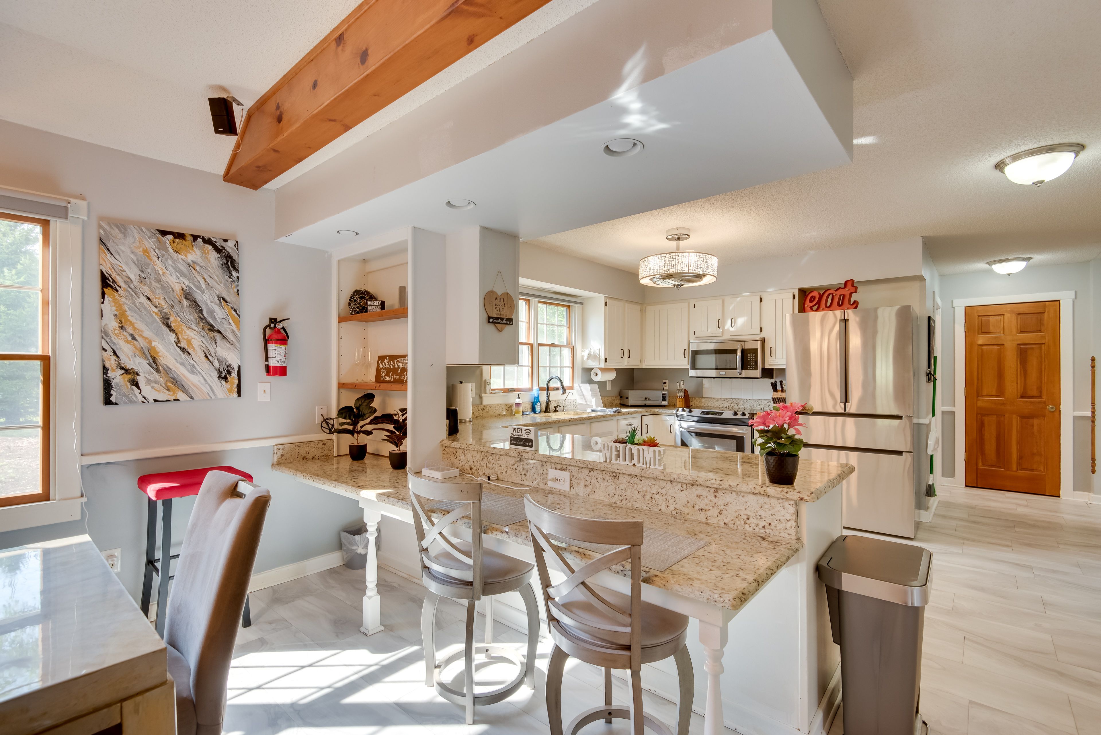 West Des Moines Vacation Rental | 5BR | 4BA | Stairs Required | 4,000 Sq Ft