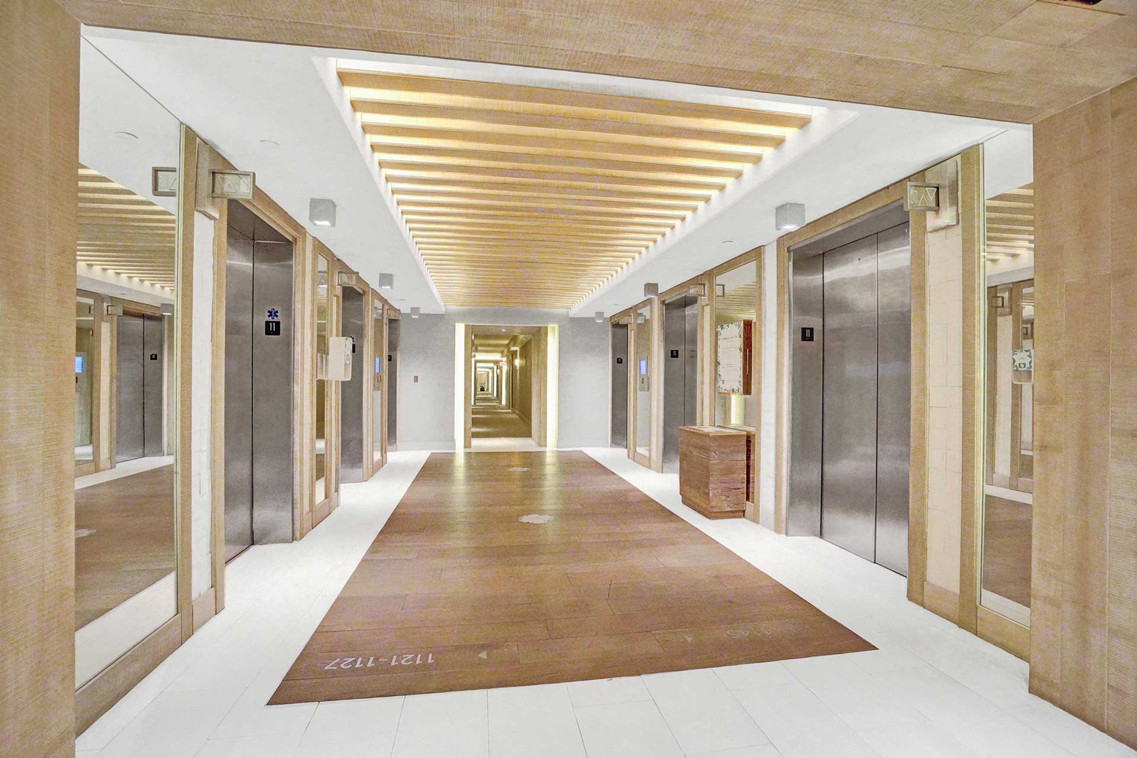Building Hallway | Elevators to Access Unit Entrance | Keyless Entry