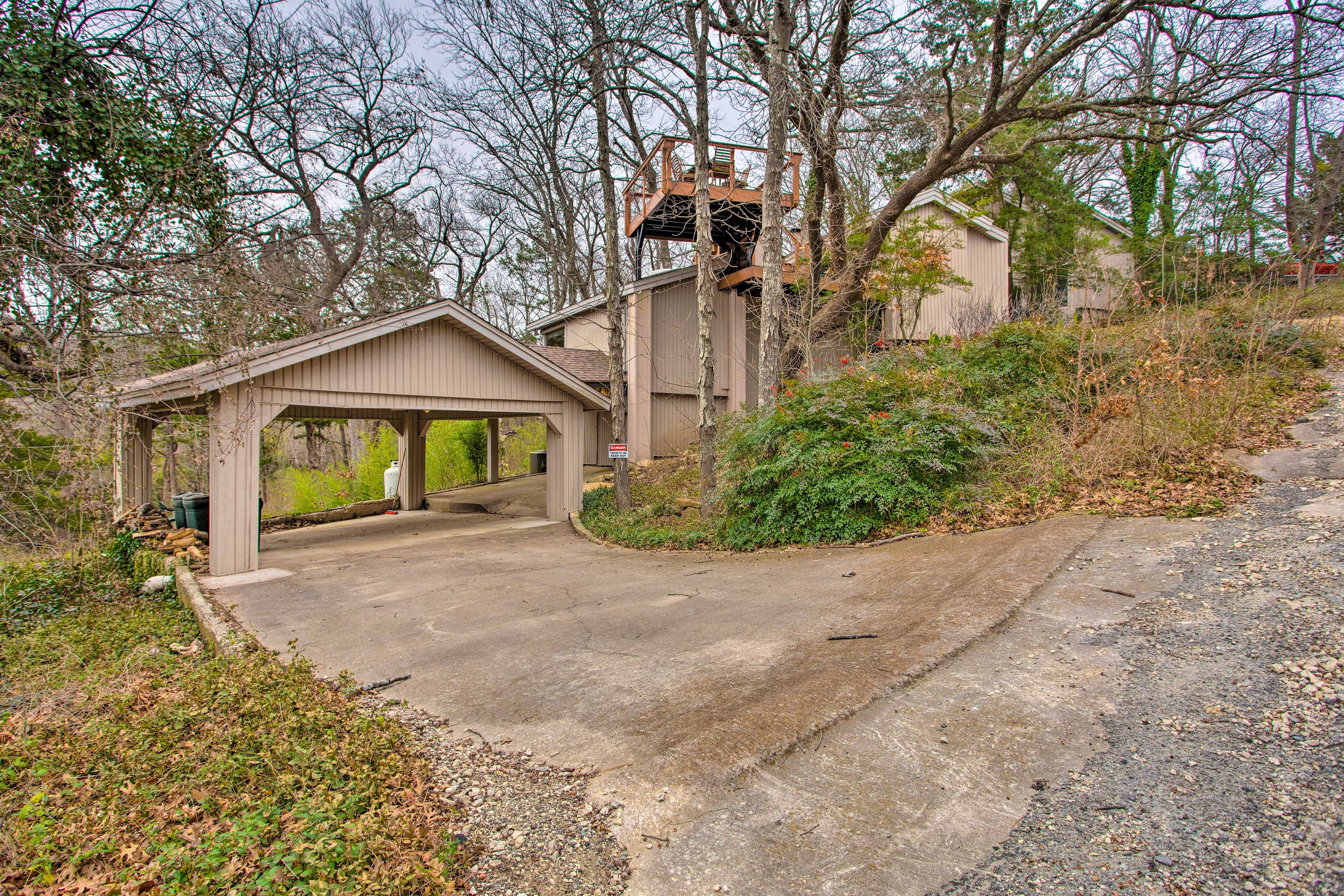 Parking: Carport (2 vehicles), Driveway (3 vehicles)
