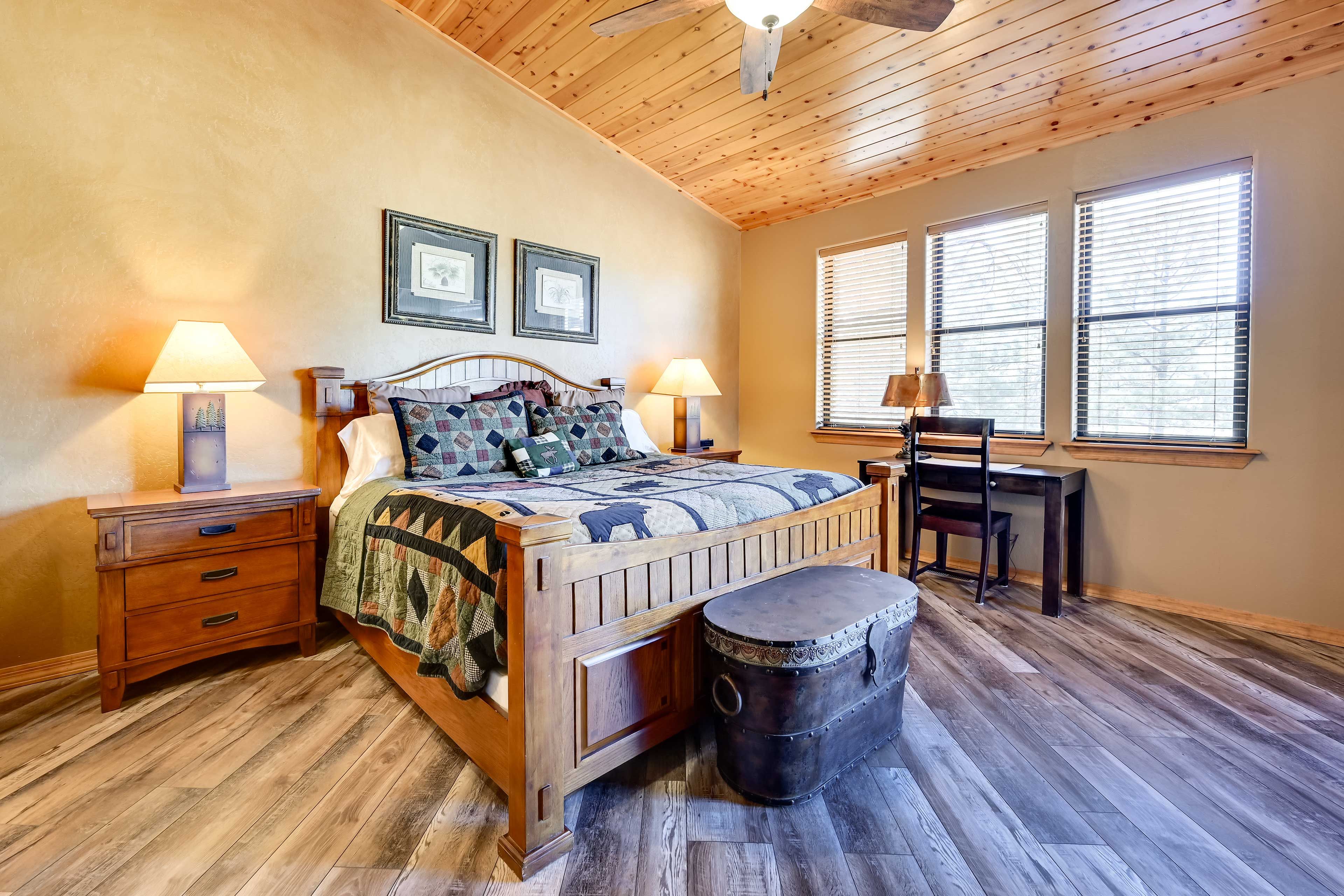 Bedroom 1 (Suite) | King Bed | Laptop-Friendly Workspace | Deck Access
