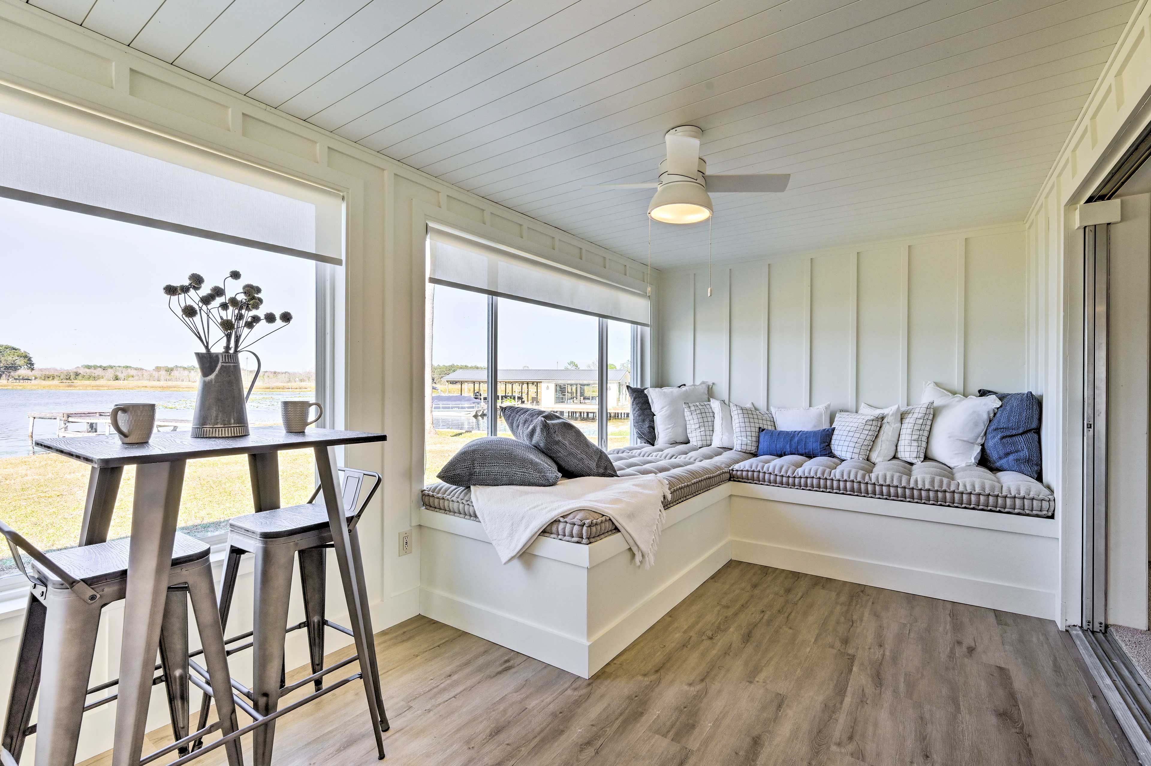 Sunroom | Ceiling Fans | Custom Benches | Water Views