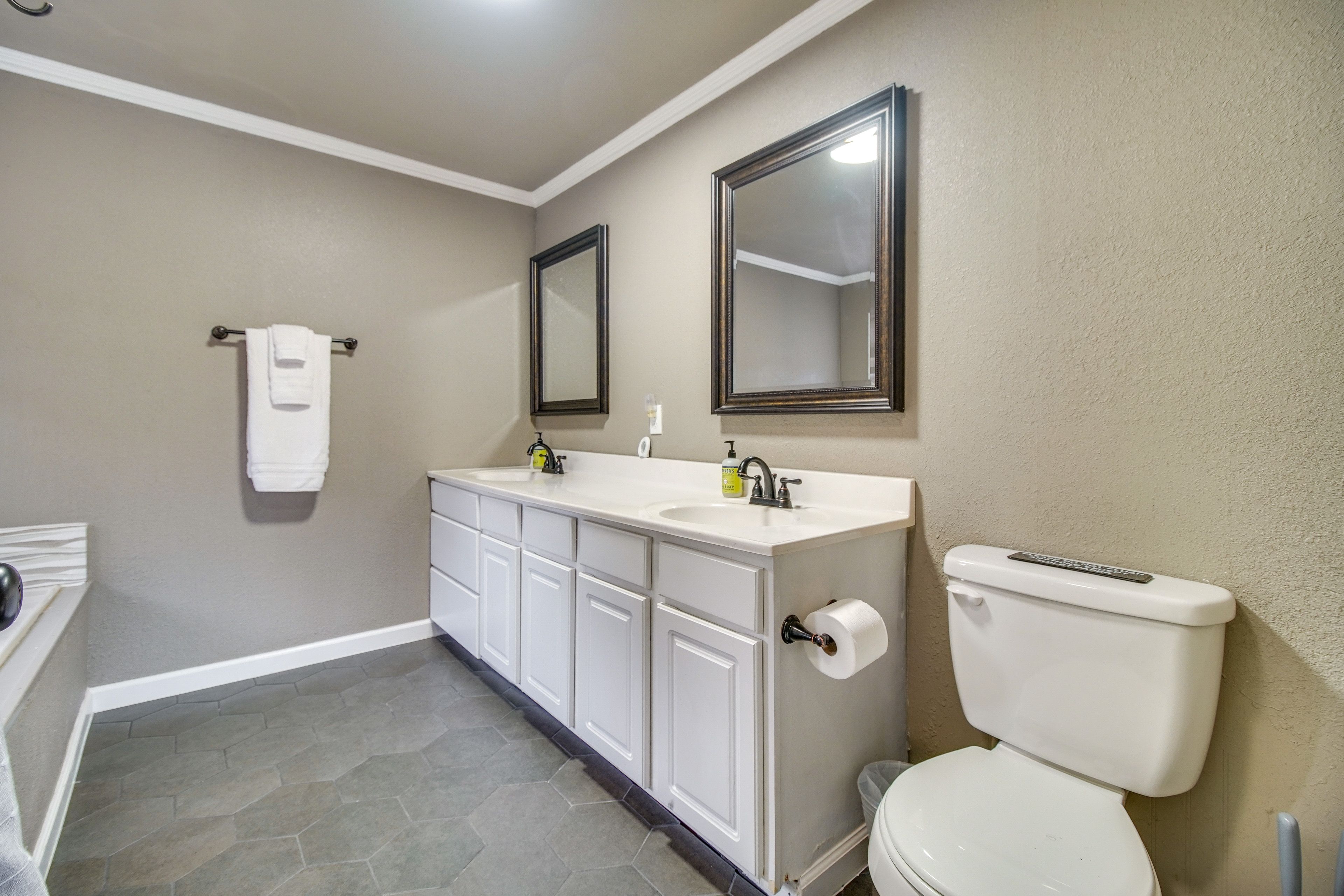 En-Suite Bathroom | Towels & Linens Provided | Main Level