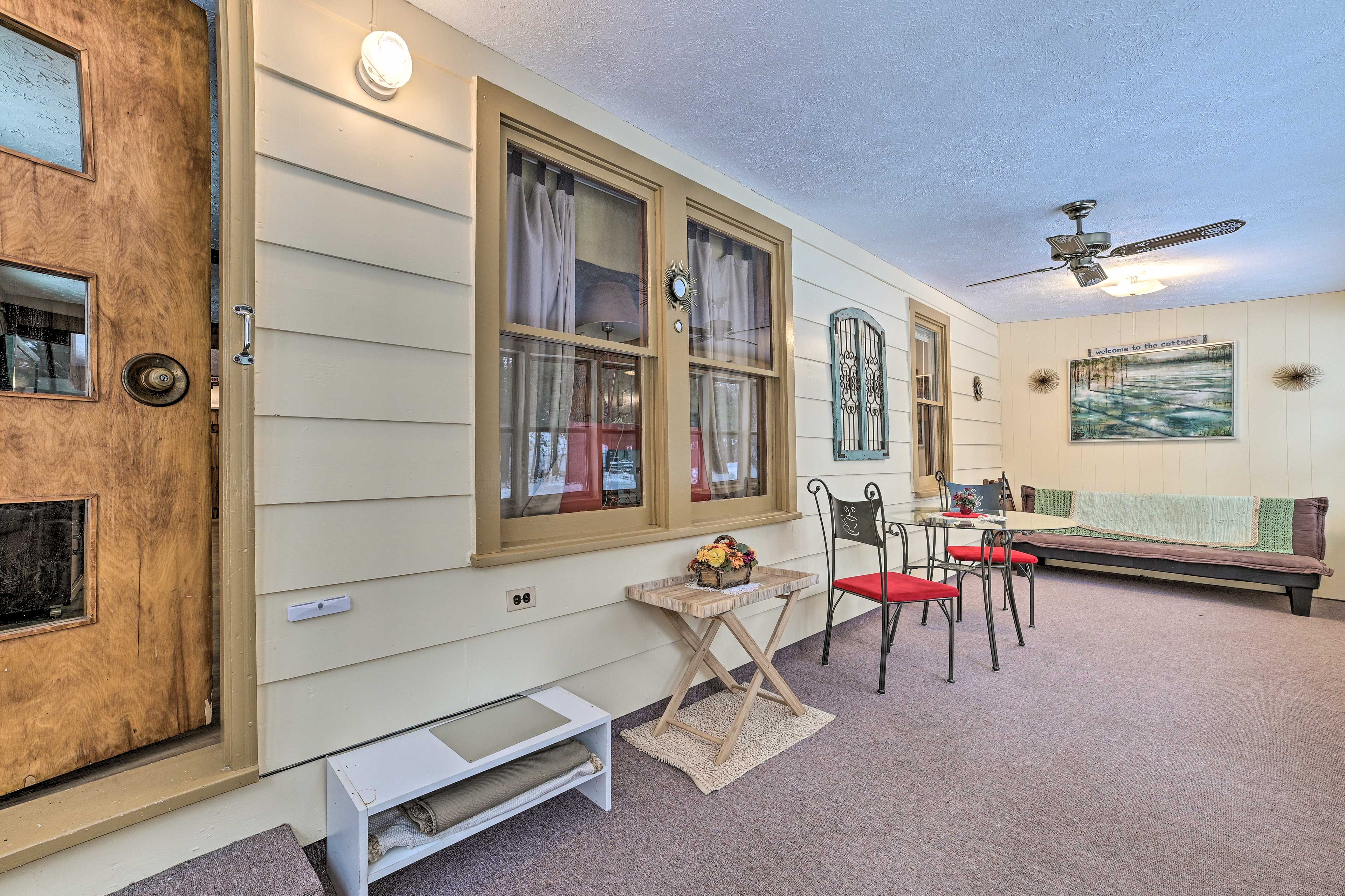 Enclosed Porch | Coin Laundry Facilities Nearby