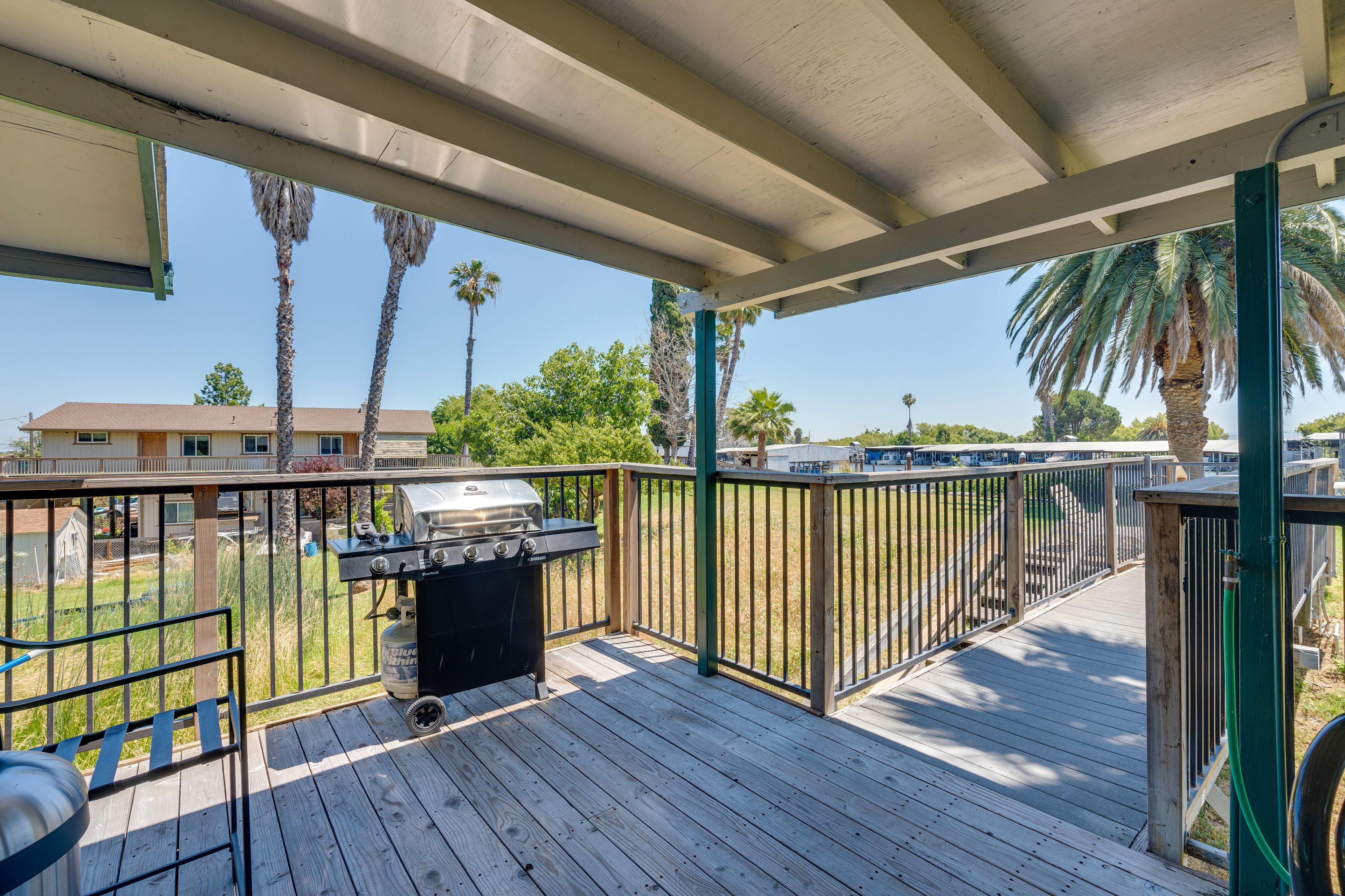 Covered Deck | Outdoor Dining | Gas Grill | Upper Level Unit