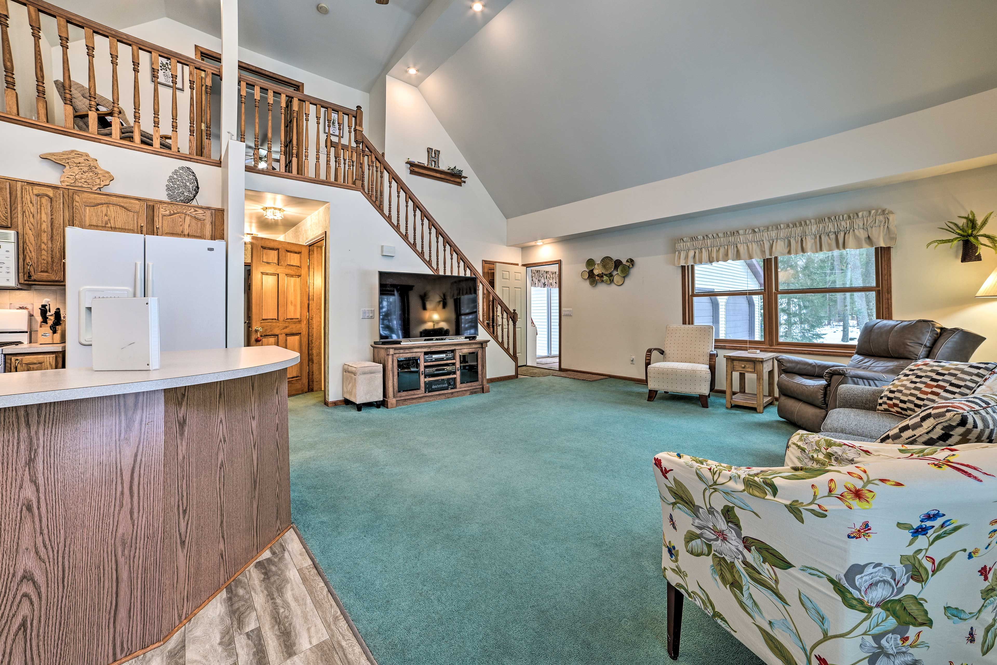 Living Room | 1st-Floor Bedroom/Bathroom | 2 Exterior Security Cameras