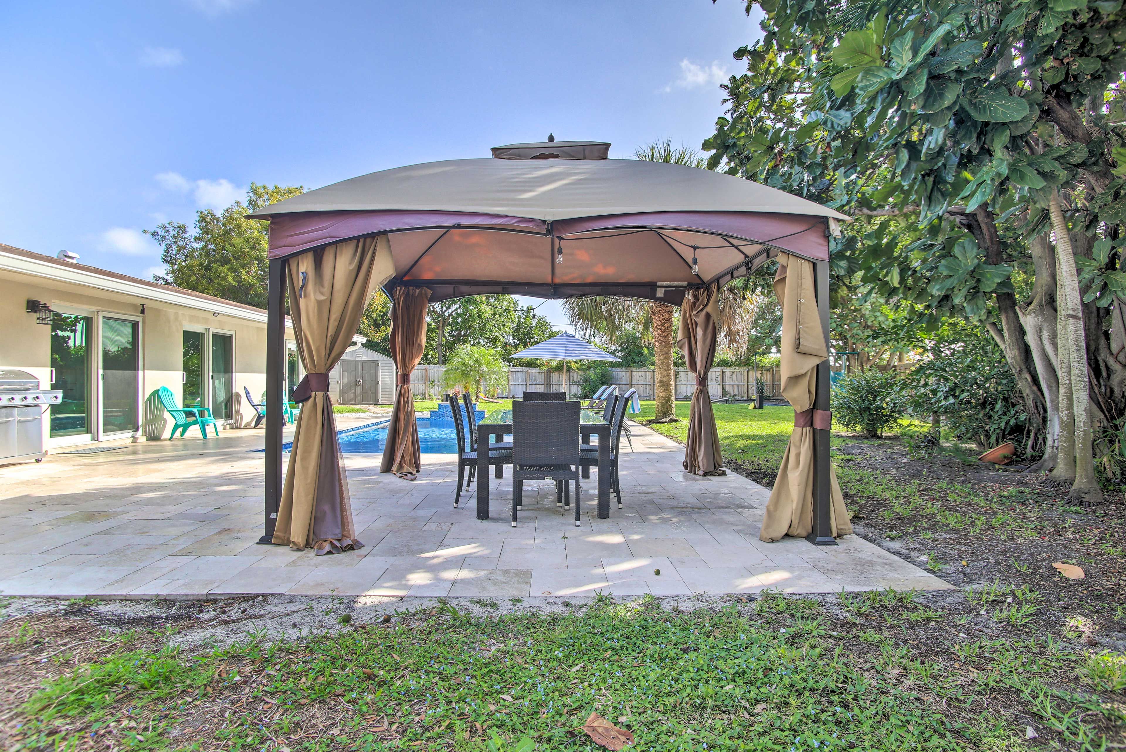 House Exterior | Covered Dining Area