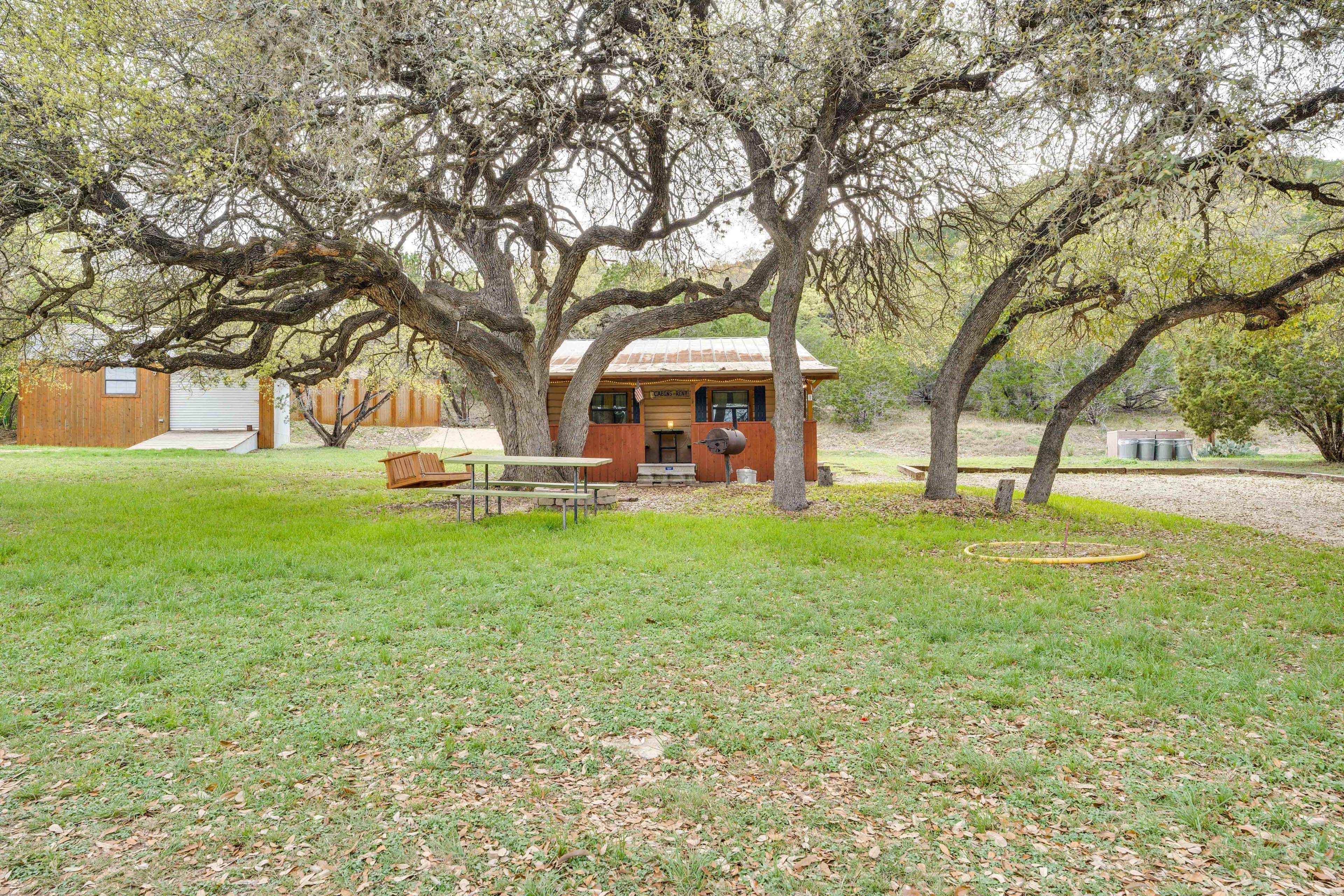 Concan Vacation Rental | 2BR | 1BA | 800 Sq Ft | 1 Step to Enter