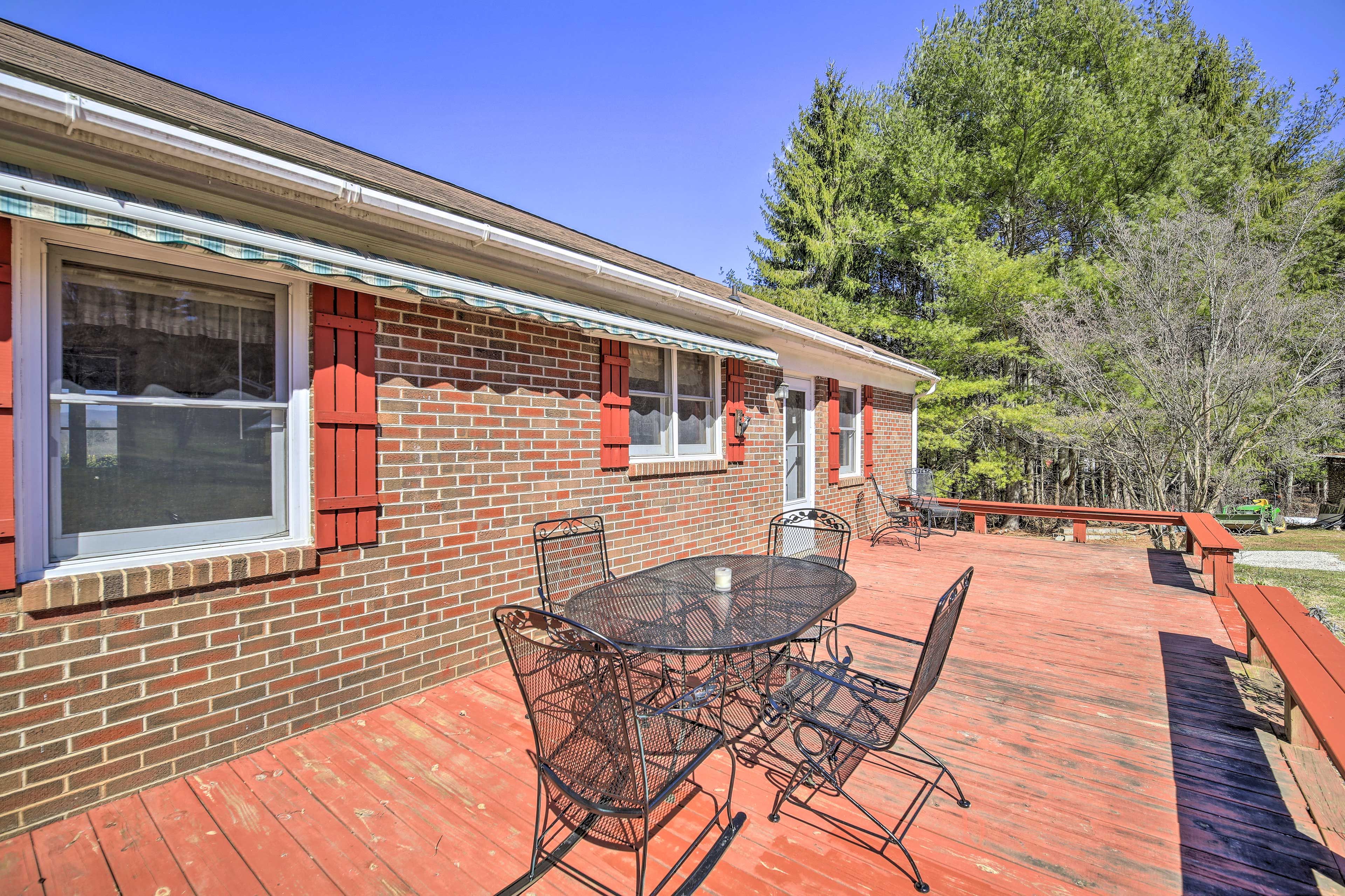 Deck | Wooded & Mountain Views