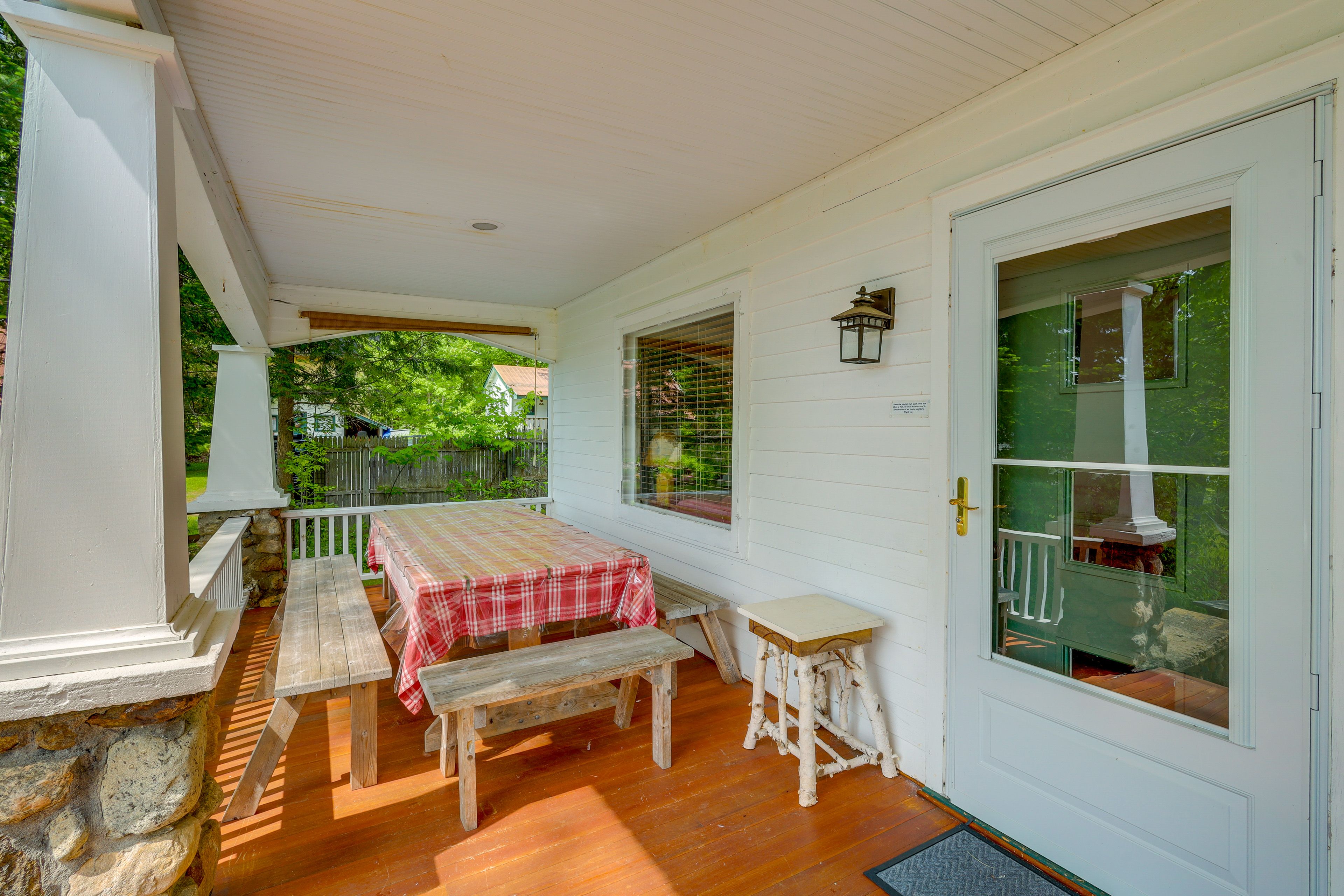 Covered Porch | Seating & Dining | Lake Views
