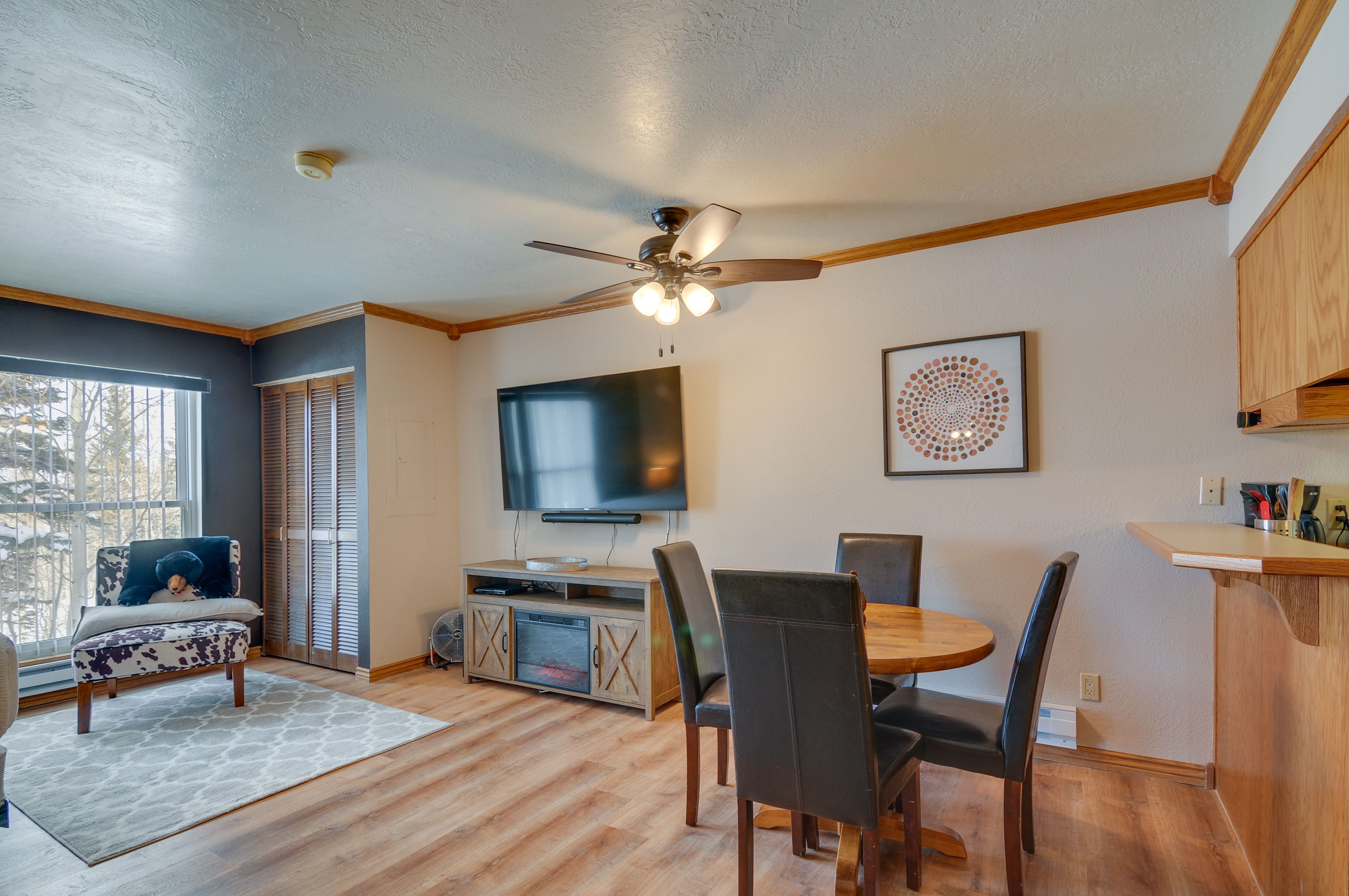 Living Area | Smart TV w/ Sound Bar | Electric Fireplace
