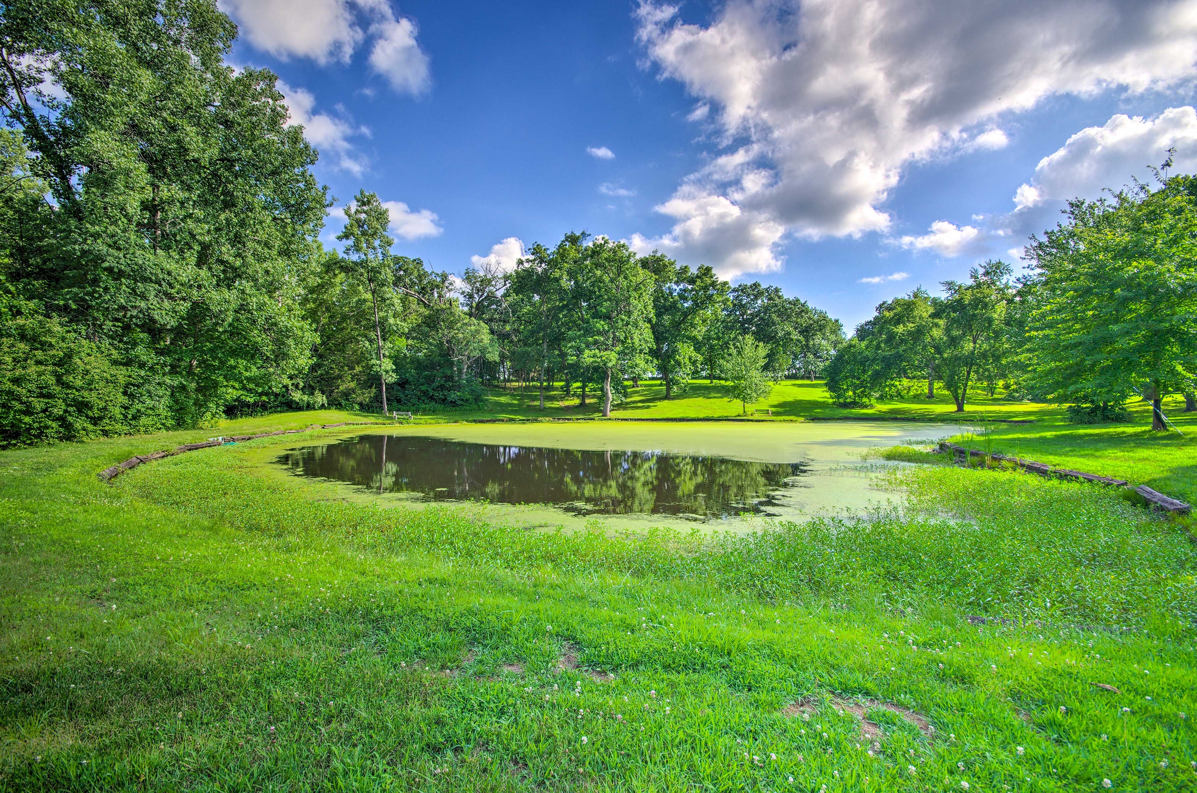 Apartment Exterior | Pond On-Site