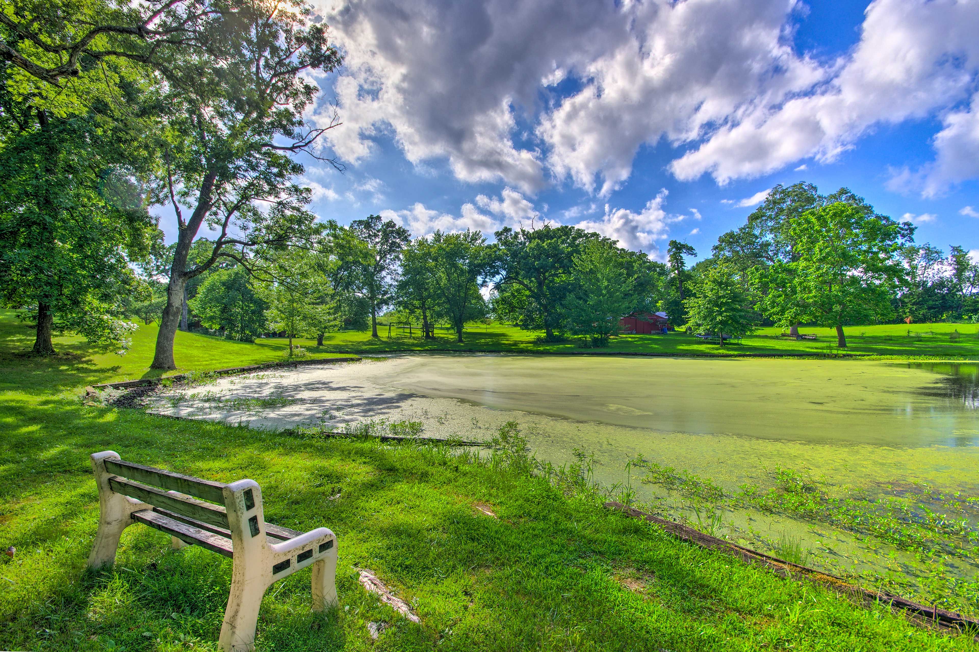 Apartment Exterior | Pond On-Site