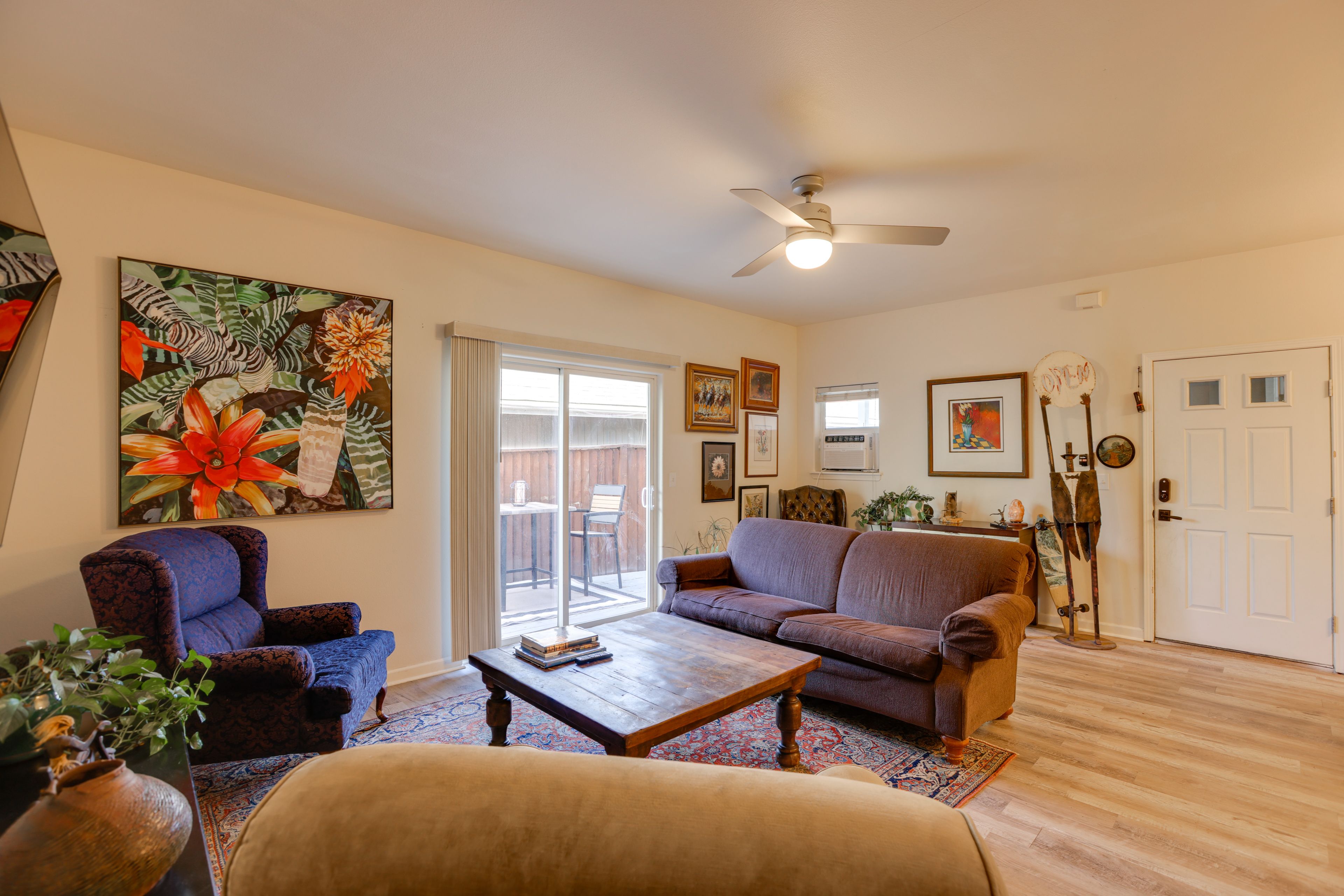 Living Room | Single-Story Unit | Patio Access | Window A/C Unit