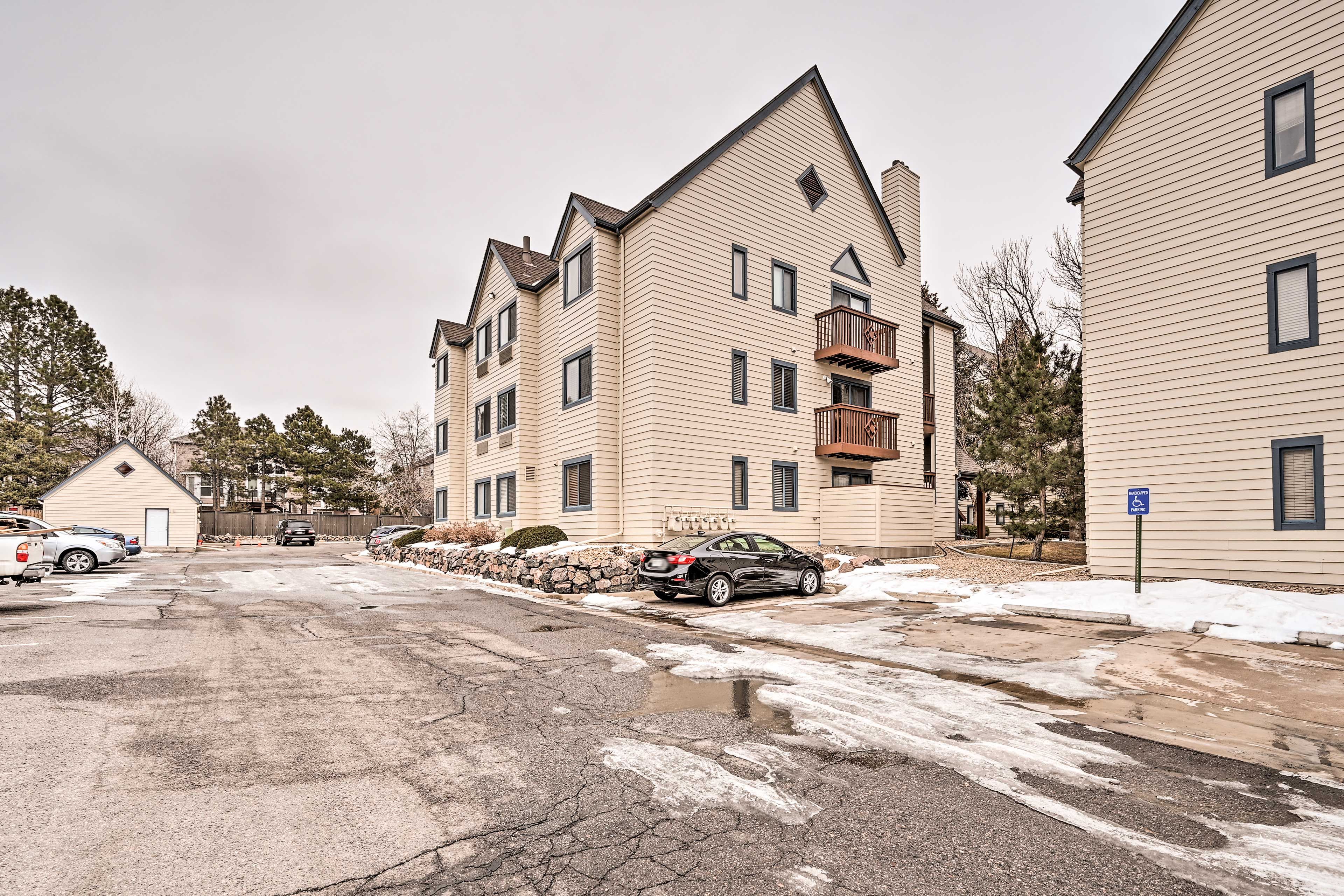 Property Exterior | Community Parking Lot (2 Vehicles)